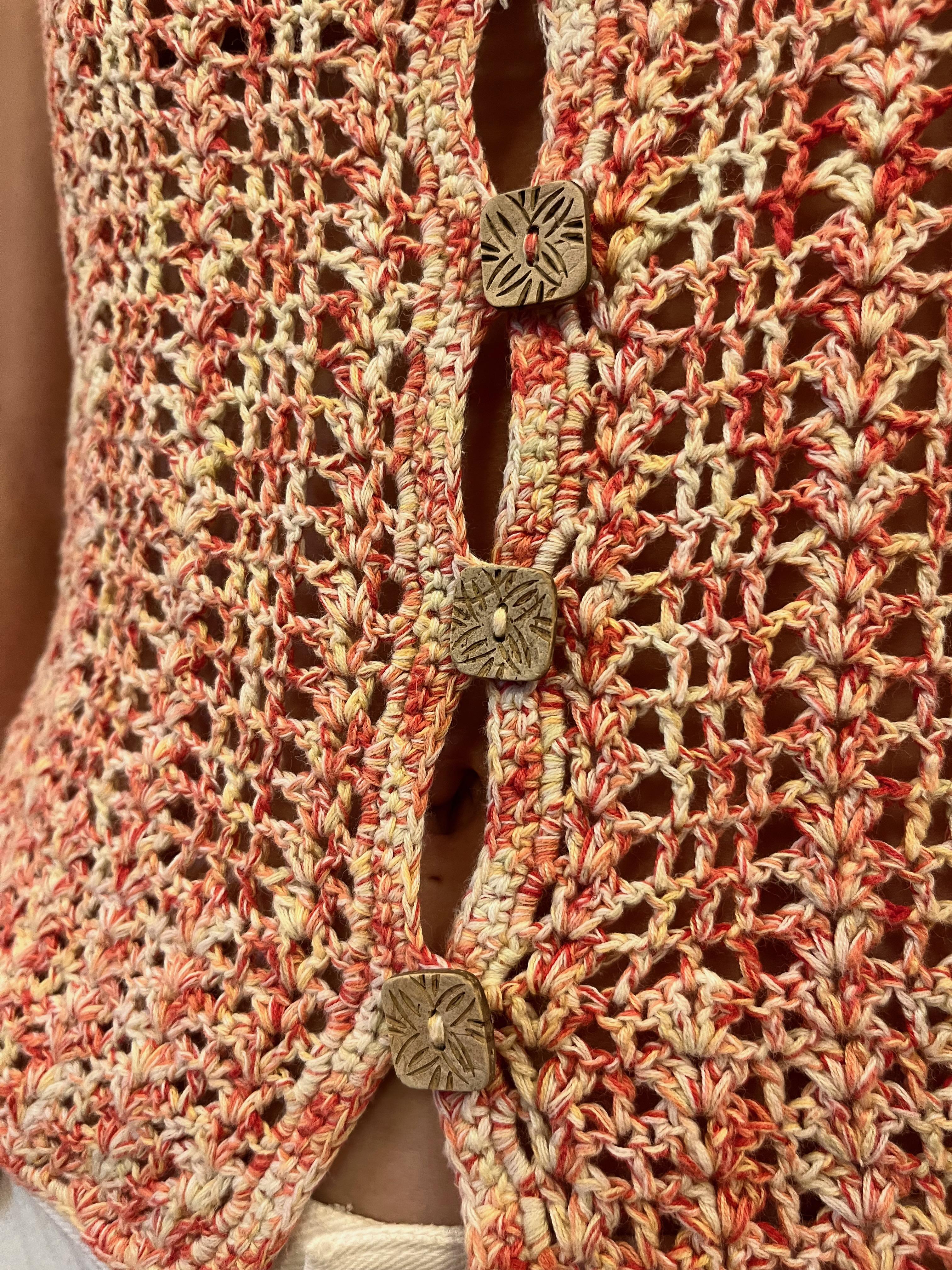 1960s Rose & Natural Crochet Top with Engraved Coconut Buttons. 

Excellent condition. Great for summer. Beautiful colors and details. Coconut buttons add a unique touch!