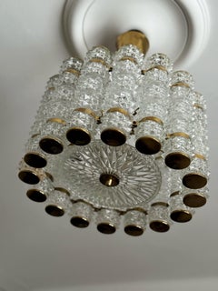 1960s, Crystal and Brass Cylinder Chandelier by Orrefors for Tyringe, Sweden.
