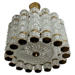 1960s, Crystal and Brass Cylinder Chandelier by Orrefors for Tyringe, Sweden.