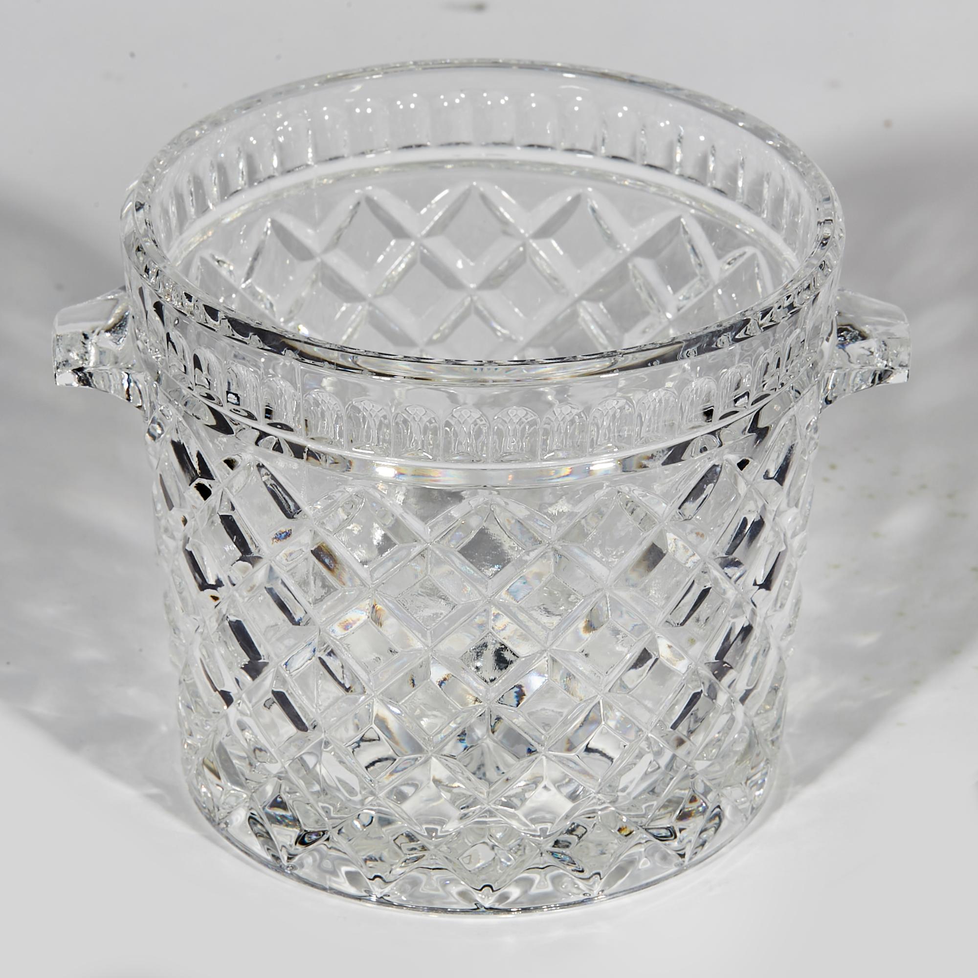 Vintage 1960s solid crystal waffle designed glass ice bucket. No marks. In very good used condition.