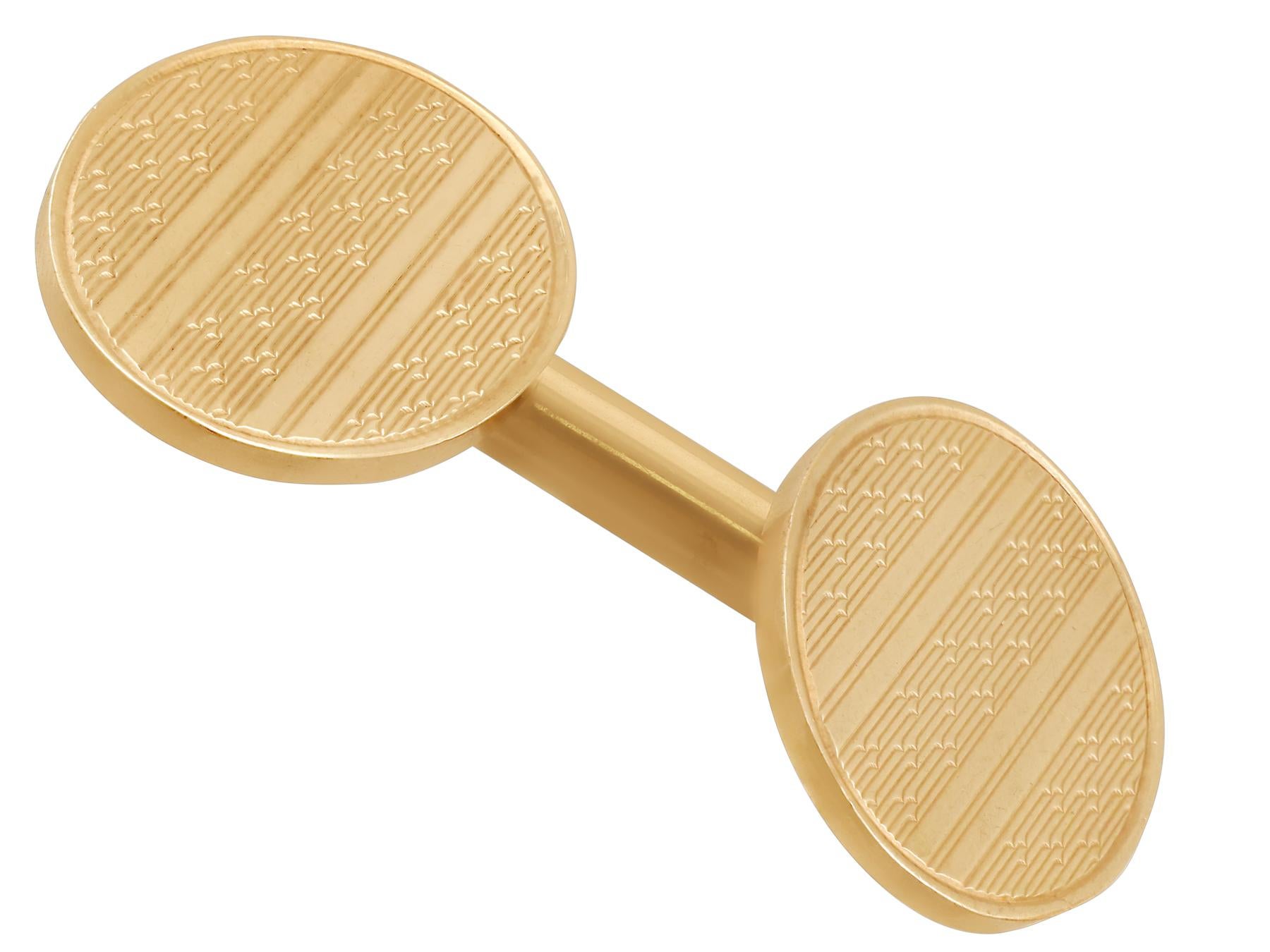 A fine and impressive pair of vintage 9 karat yellow gold cufflinks; an addition to our men's jewelry and estate jewelry collections.

These authentic vintage cufflinks have been crafted in 9k yellow gold.

The cufflinks have an oval form.

Each