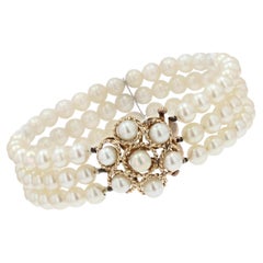 Bracelet  3 ranges de fleurs en or jaune 18 carats avec perles de culture, annes 1960