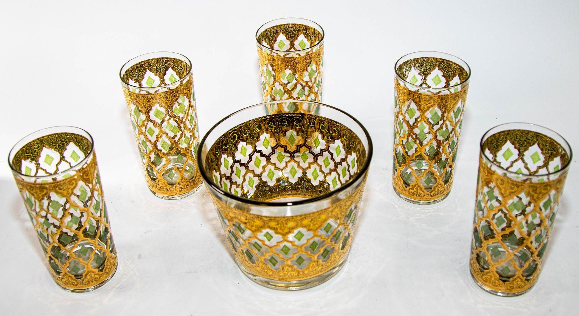 1960s Set of Five Vintage Culver Ltd Highball Glasses and Ice Bucket with 22-Karat Gold Valencia Design.
Elegant vintage mid-century Culver Ltd barware with Valencia pattern in a gold leaf finish.
Set includes 5 highball tumbler glasses and one ice