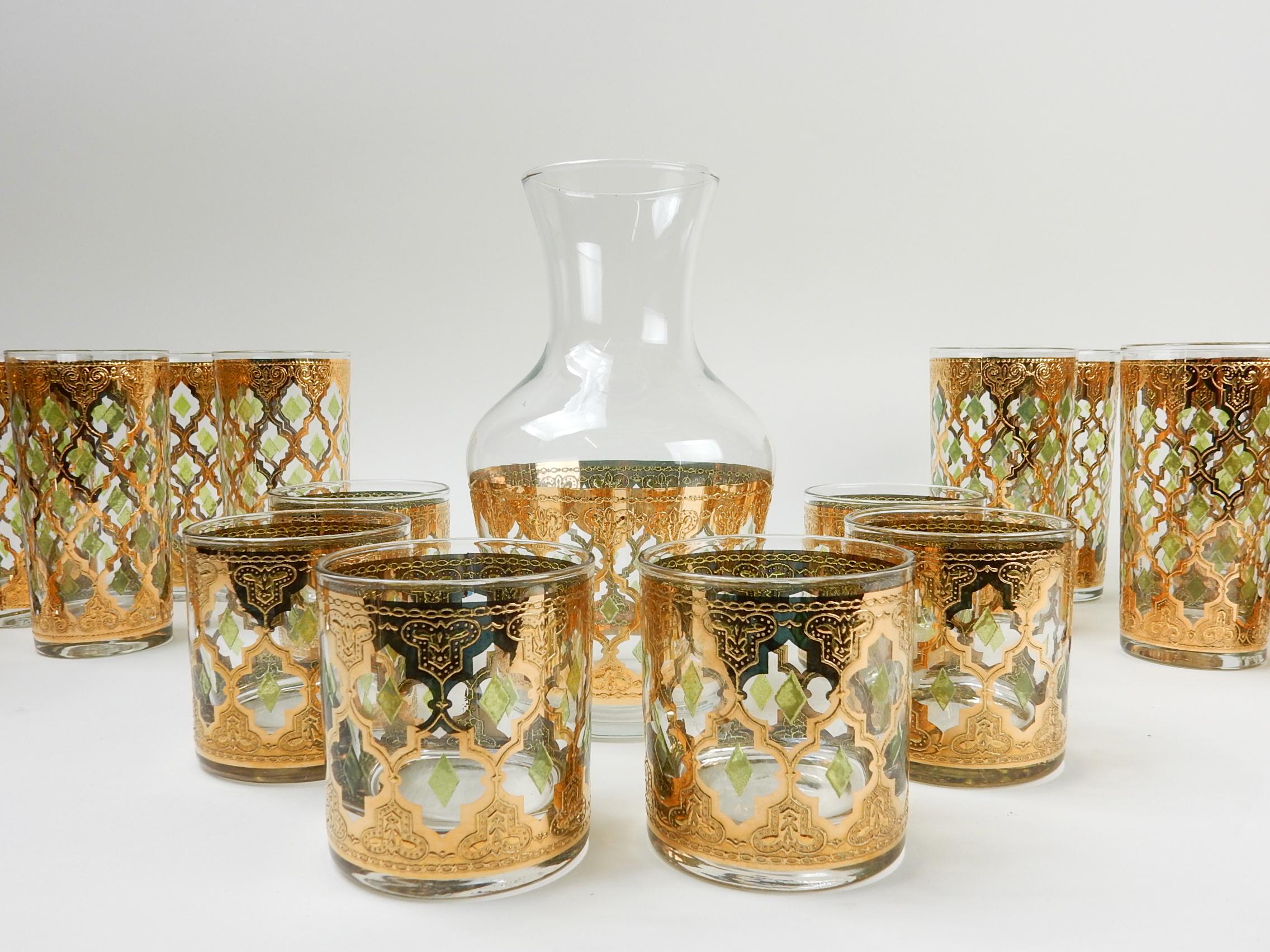 Fabulous set of Culver Ltd ~Valencia~ 22-karat. Gold with emerald diamonds
bar glasses.
Included is a set of 12 hi-ball glasses, 6 rocks glasses and decanter.
All are in excellent condition showing little to no wear.
 