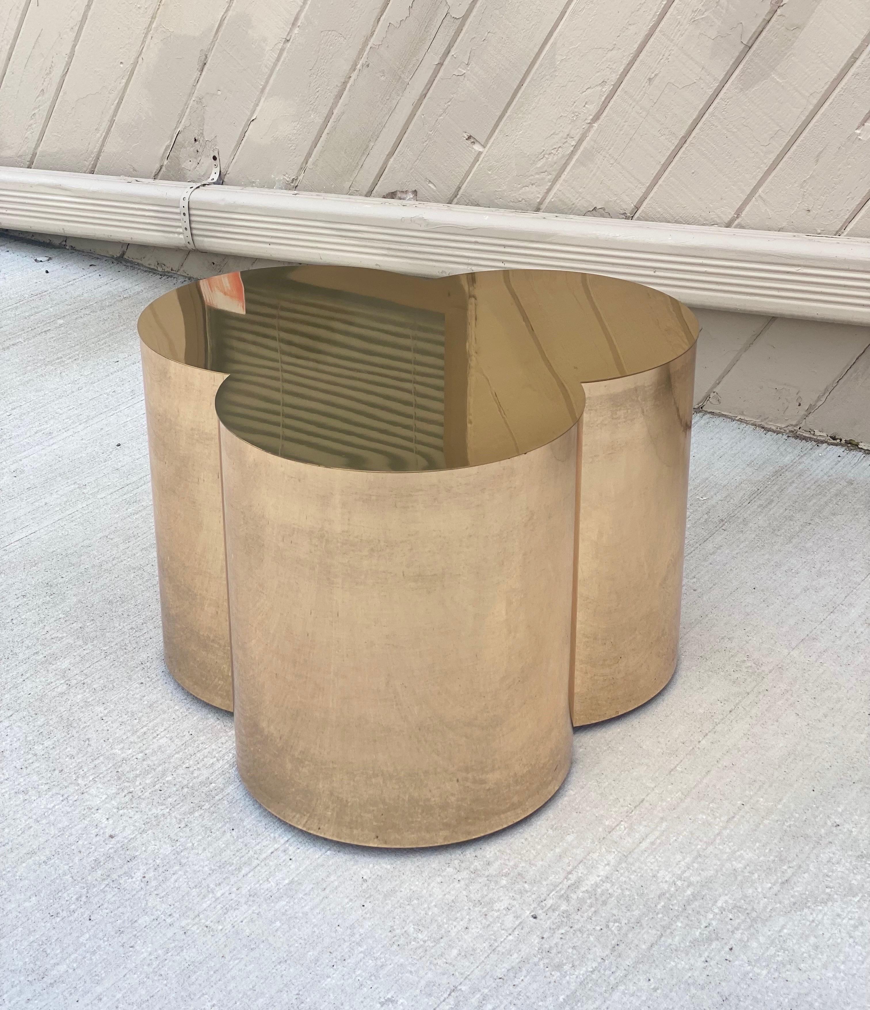 We are very pleased to offer a sculptural, brass table by Curtis Jere, circa the 1960s. This beautiful piece is a classic midcentury design and a testament to modern simplicity. A .75