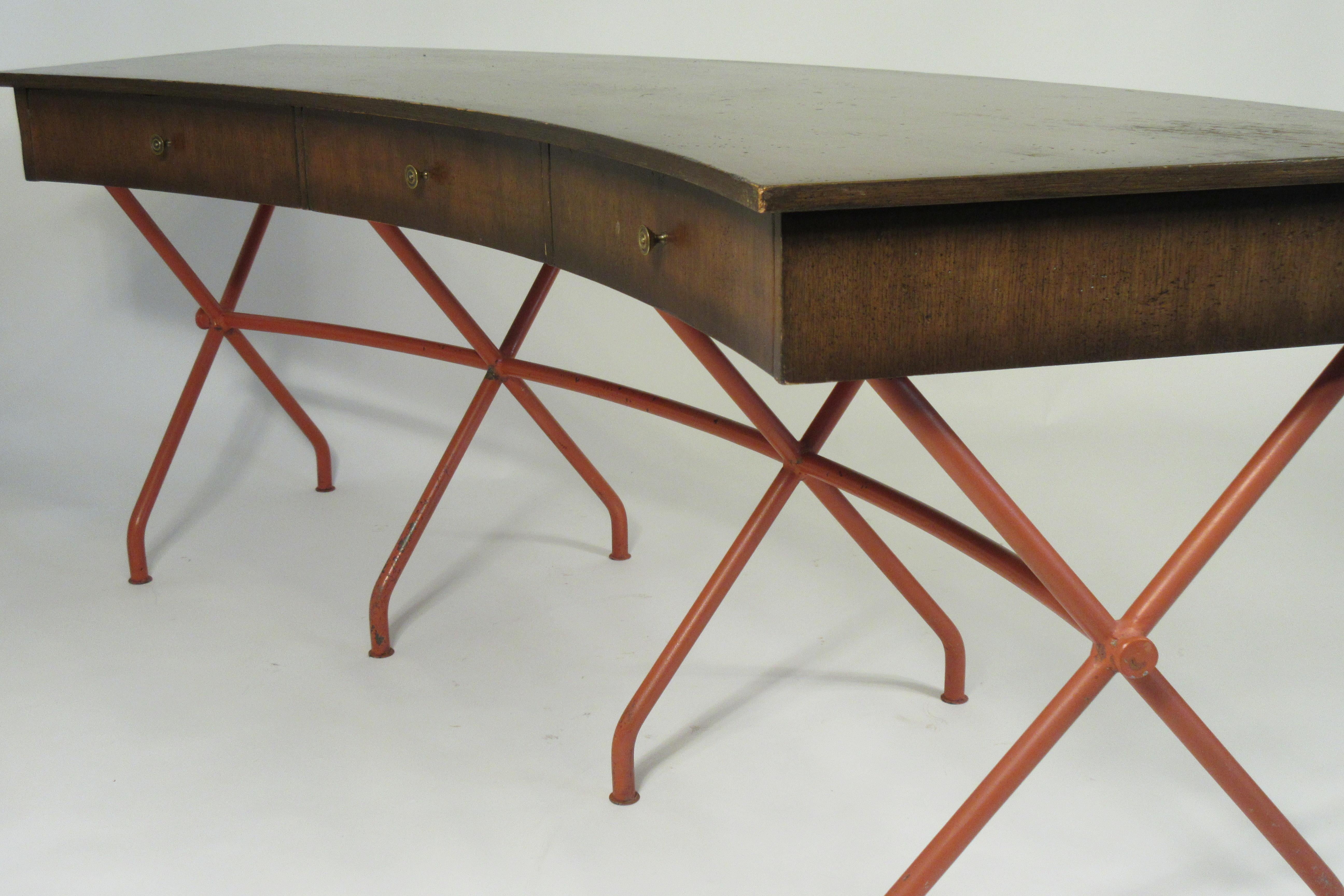 1960s curved writing desk. Wood top, iron base. Out of a huge Scarsdale, NY mansion. Needs refinishing.