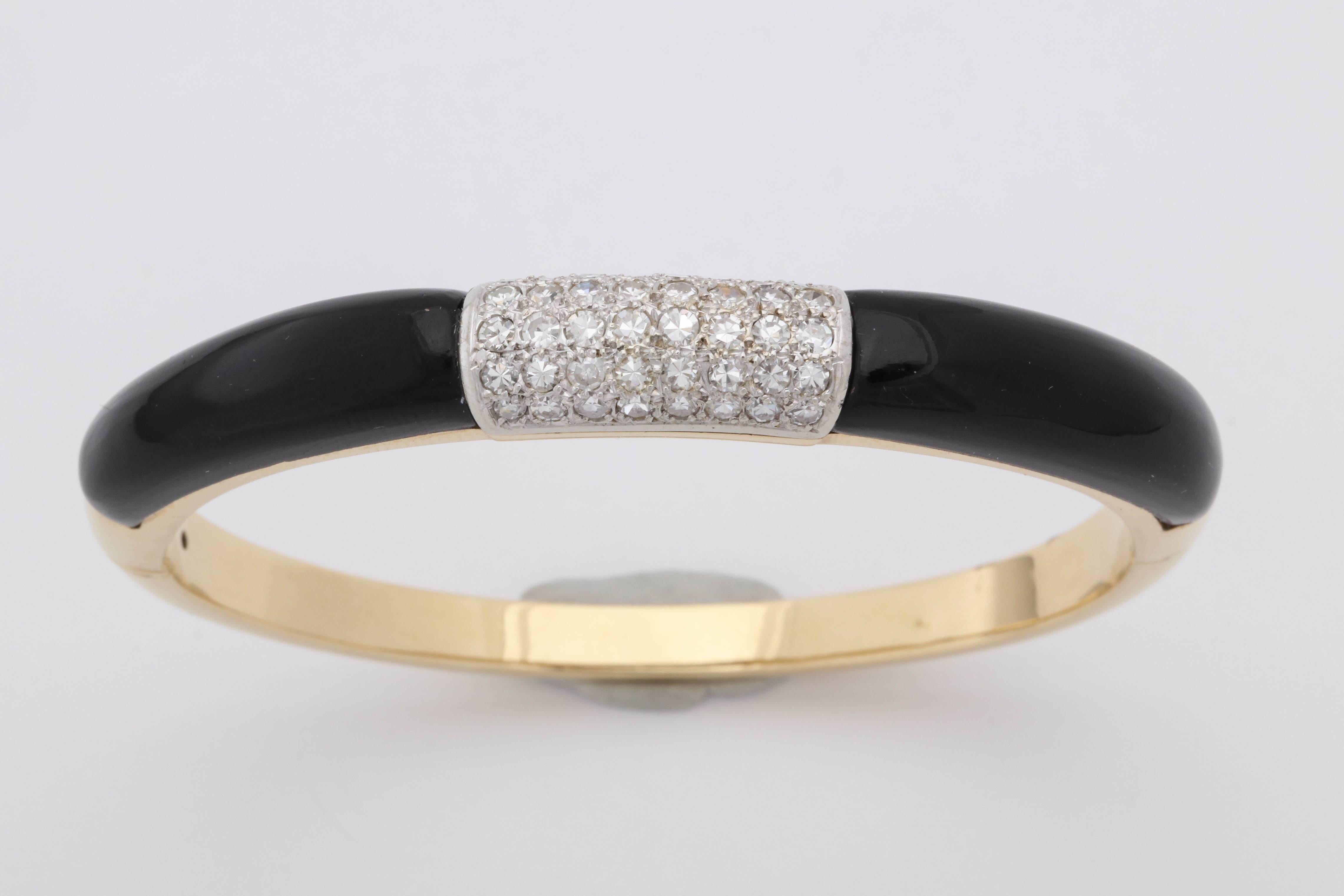 One Ladies 18kt Gold Bangle Bracelet Embellished with Five Rows Of Diamonds Weighing Approximately 2 Carats. Flanked By {2} Custom Cut Contour Onyx Stones . DEsigned In The 1960's In The United States Of America. NOTE: Fits An Average Size,Standard