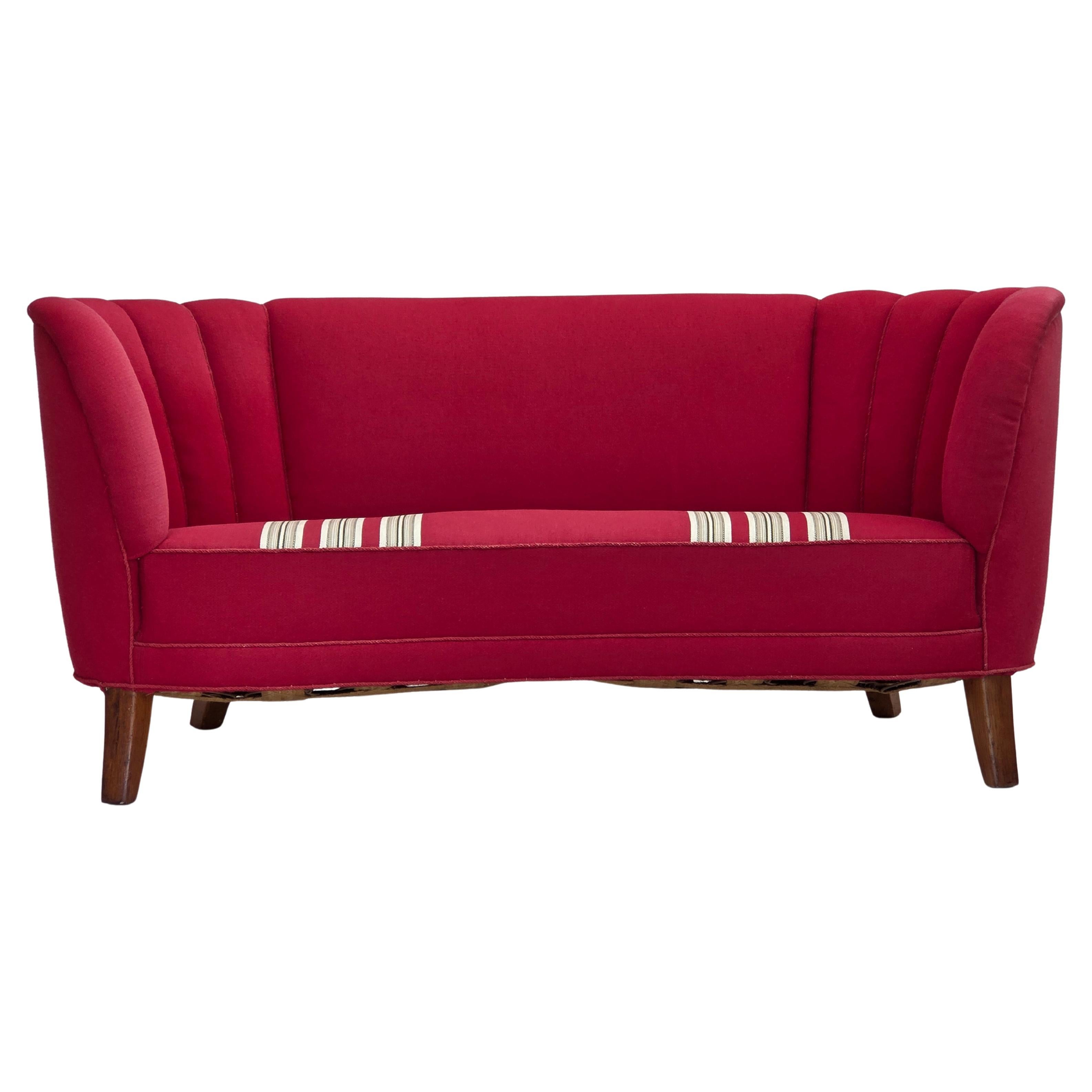 1960s, Danish 2-seater "Banana" sofa, furniture wool, oak wood legs. For Sale