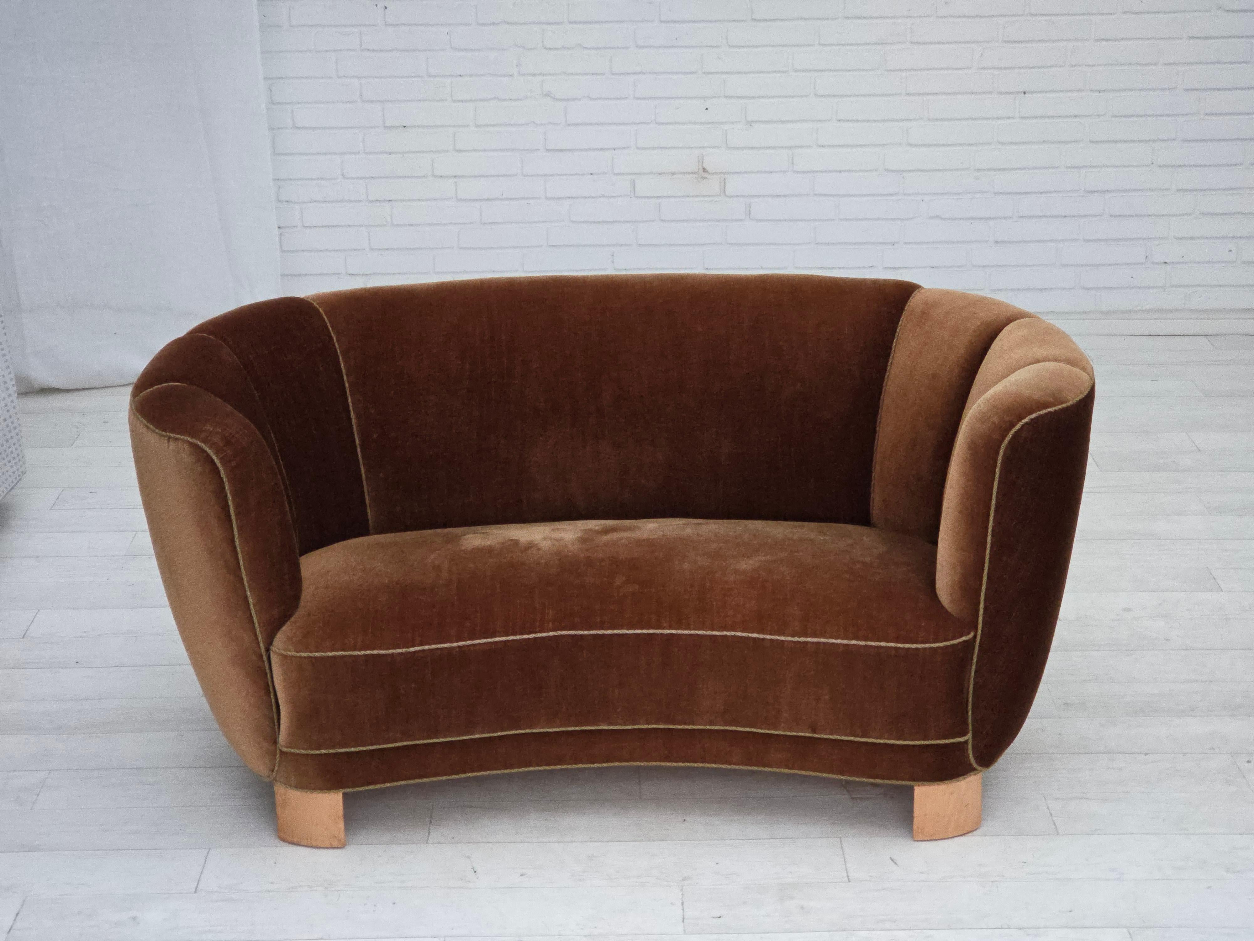 1960s, Danish 2-seater curved sofa. Brown furniture velour, beech wood legs, springs in the seat. Sofa was reupholstered by craftsman about 10 years ago. Very good condition: no smells, no stains and stable construction. Manufactured by Danish