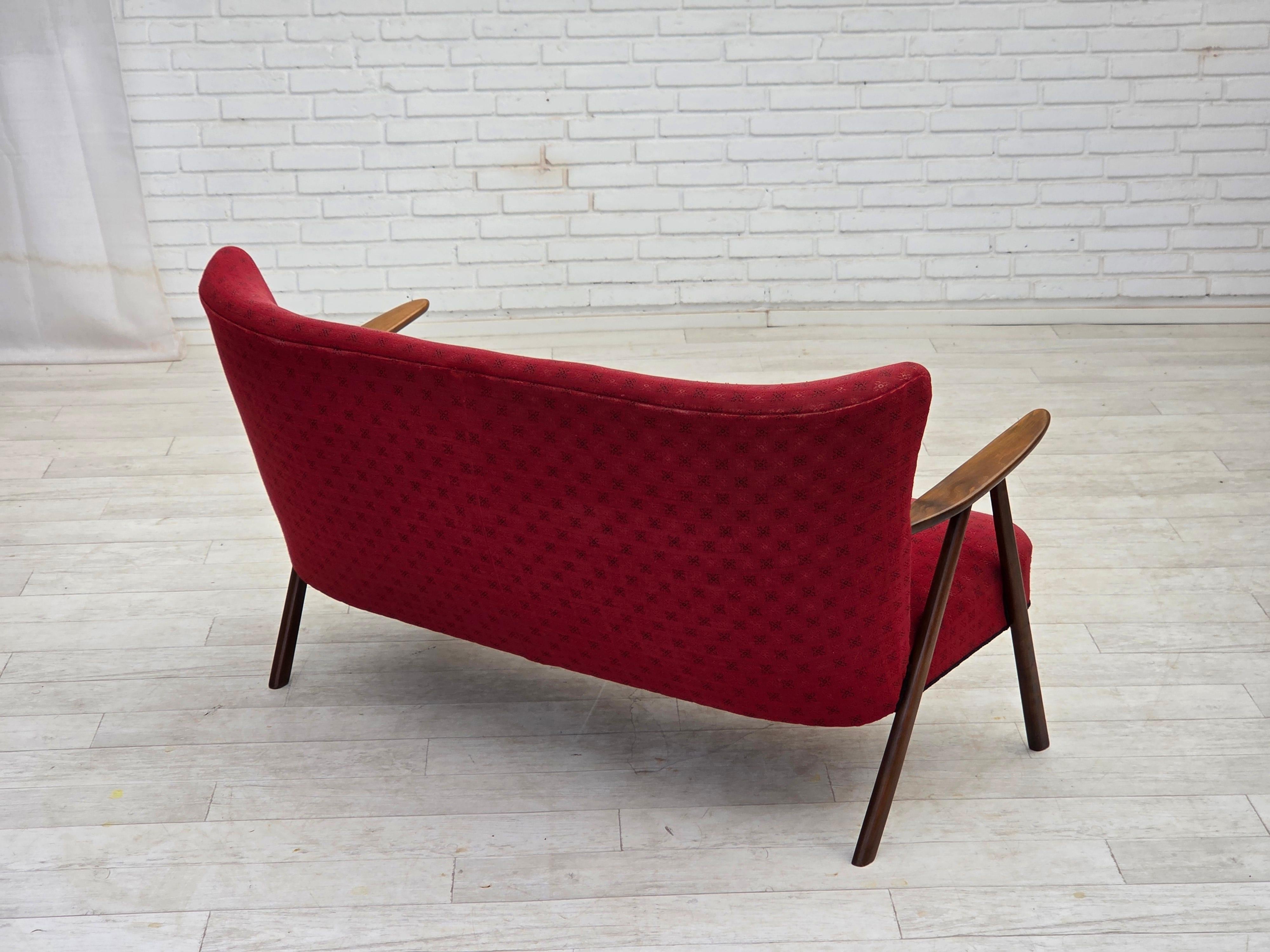 1960s, Danish 2-seater sofa, red furniture fabric, beech wood legs and armrests. For Sale 1
