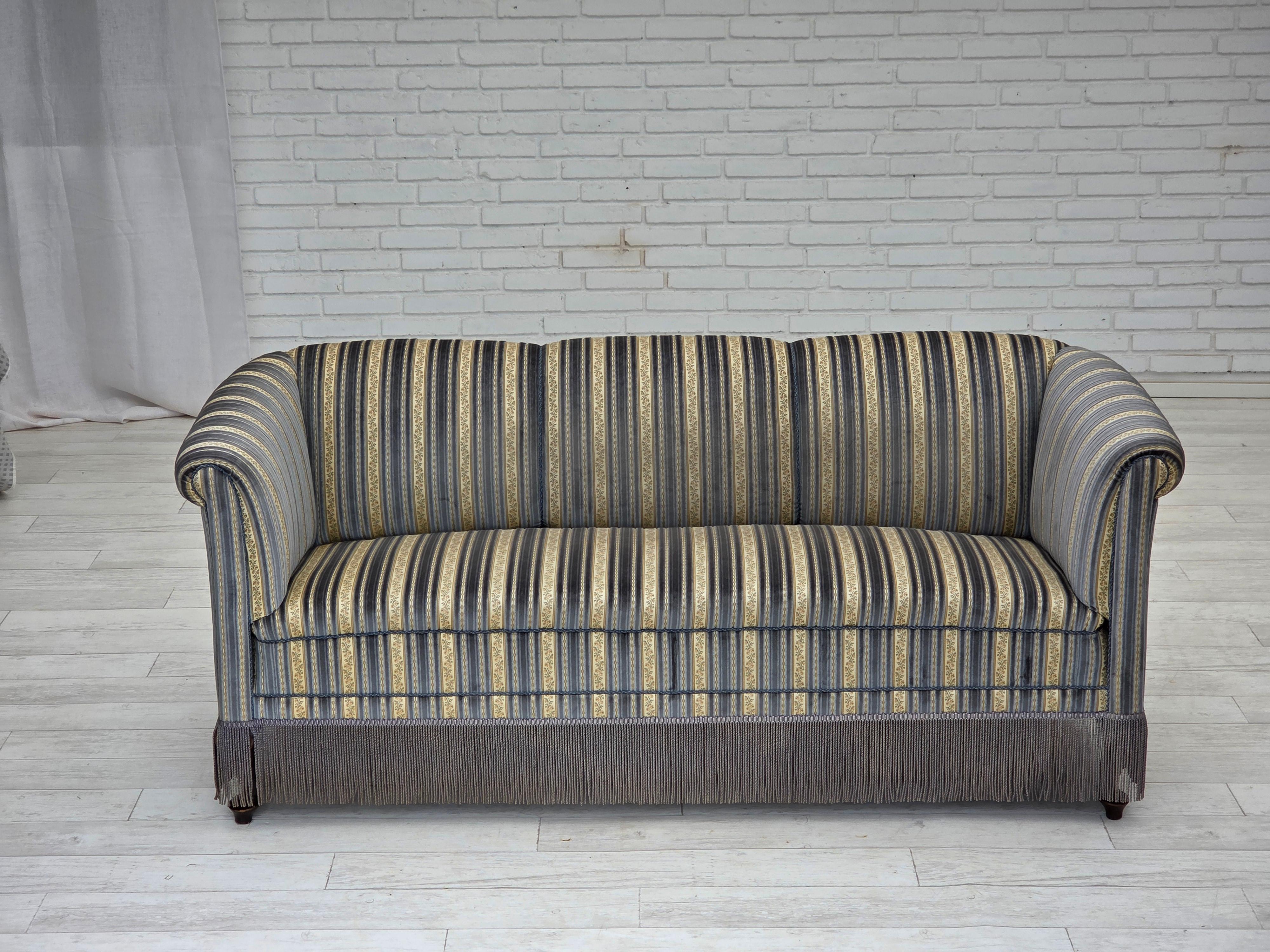 1960s, Danish 3-seater sofa. Blue/beige furniture velour, beech wood legs, brass springs in the seat. Sofa was reupholstered by craftsman about 10-15 years ago. Very good condition: no smells, no stains and stable construction. Manufactured by