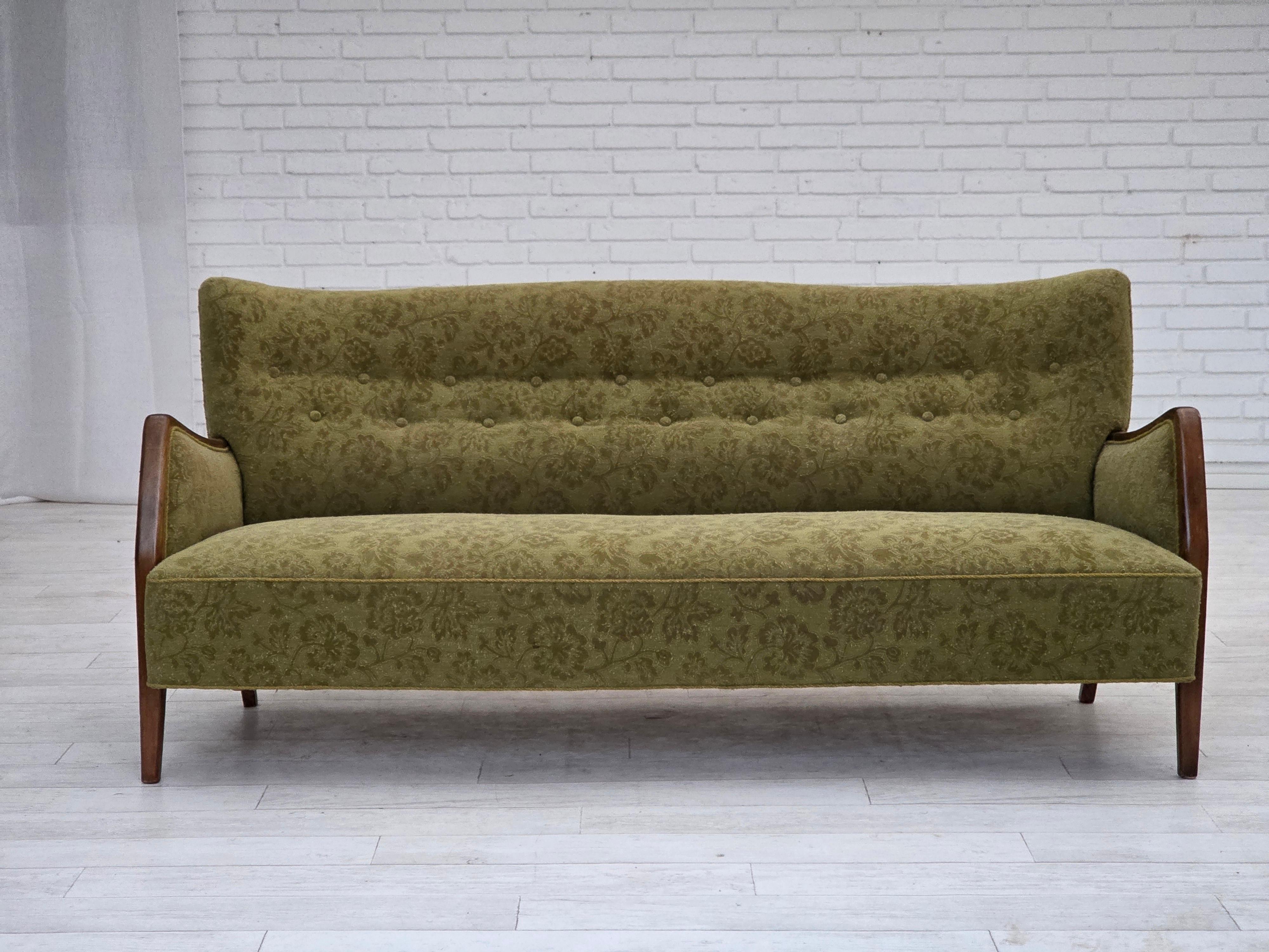 1960s, Danish 3-seater sofa. Original green furniture velour, ash wood legs and armrests, brass springs in the seat. Original good condition: no smells, no stains and stable construction. Manufactured by Danish furniture maker in about 1960-65s.