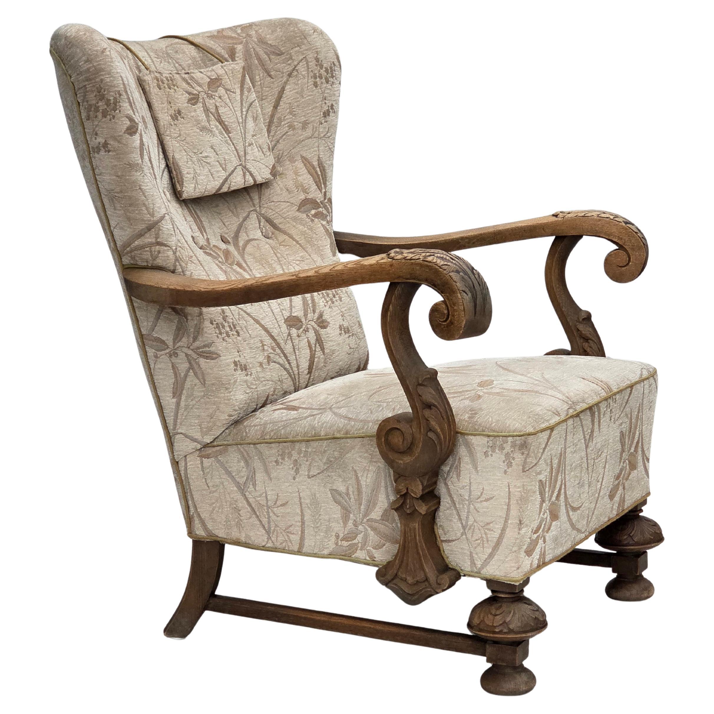1960s, Danish armchair, beige/brown furniture fabric, carved oak wood. For Sale