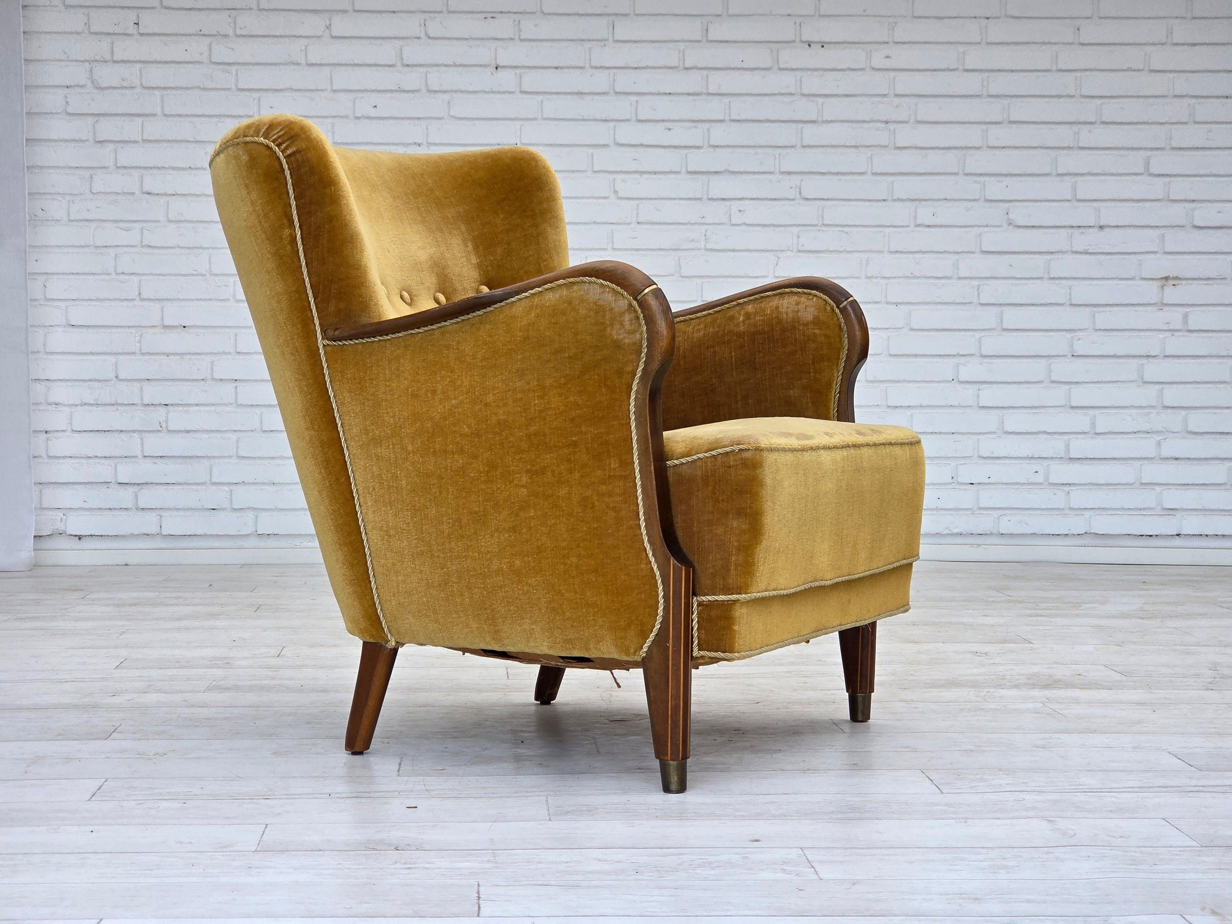 1960s, Danish armchair. Original good condition: no smells, no stains, stable construction. Original green/yellow furniture velour with patina: slight abrasion of fabric. Beech wood legs with brass plugs, brass springs in the seat. Beech Wood