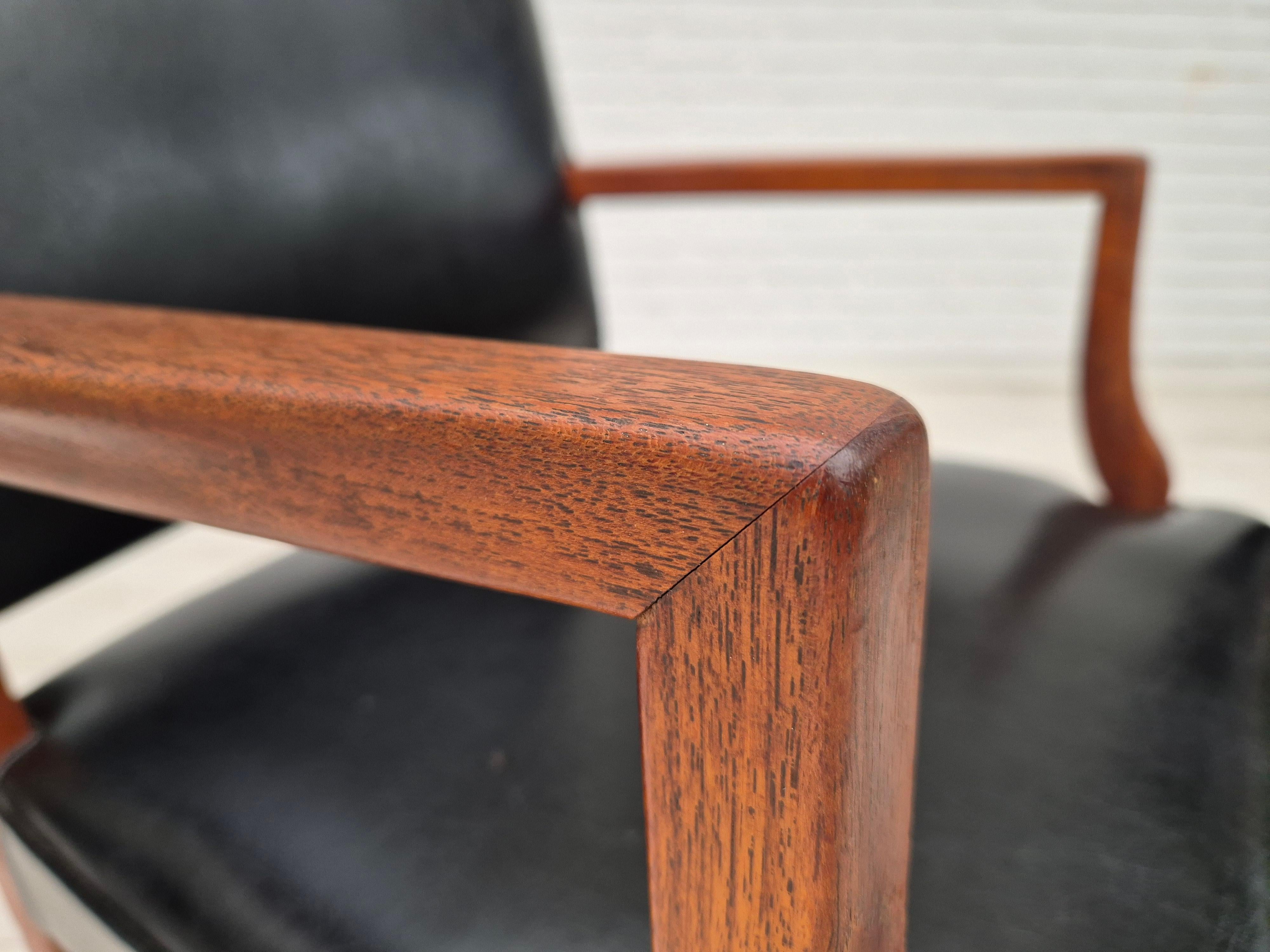 1960s, Danish armchair, original condition, teak wood, artificial leather. For Sale 8