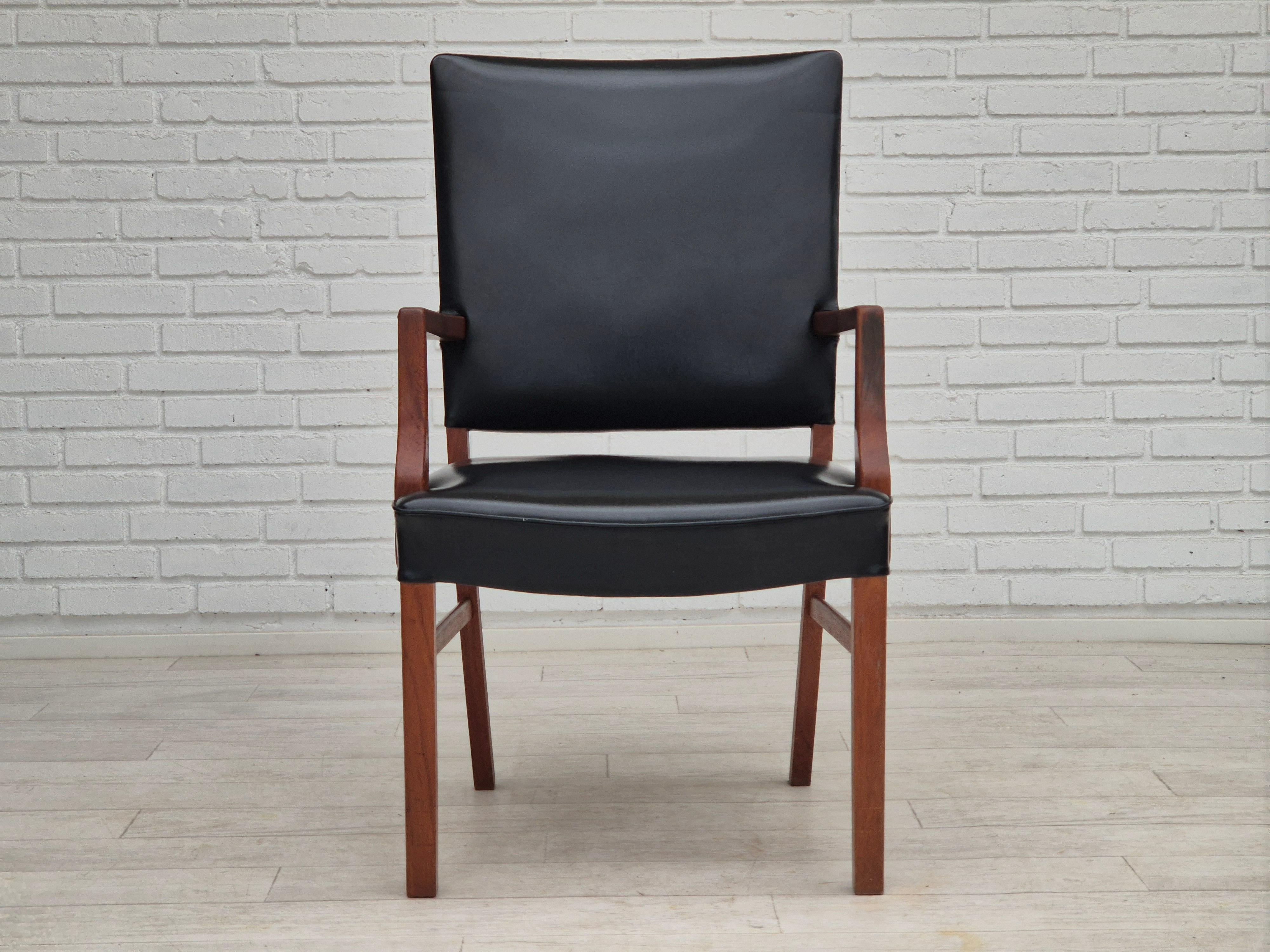 Scandinavian Modern 1960s, Danish armchair, original condition, teak wood, artificial leather. For Sale