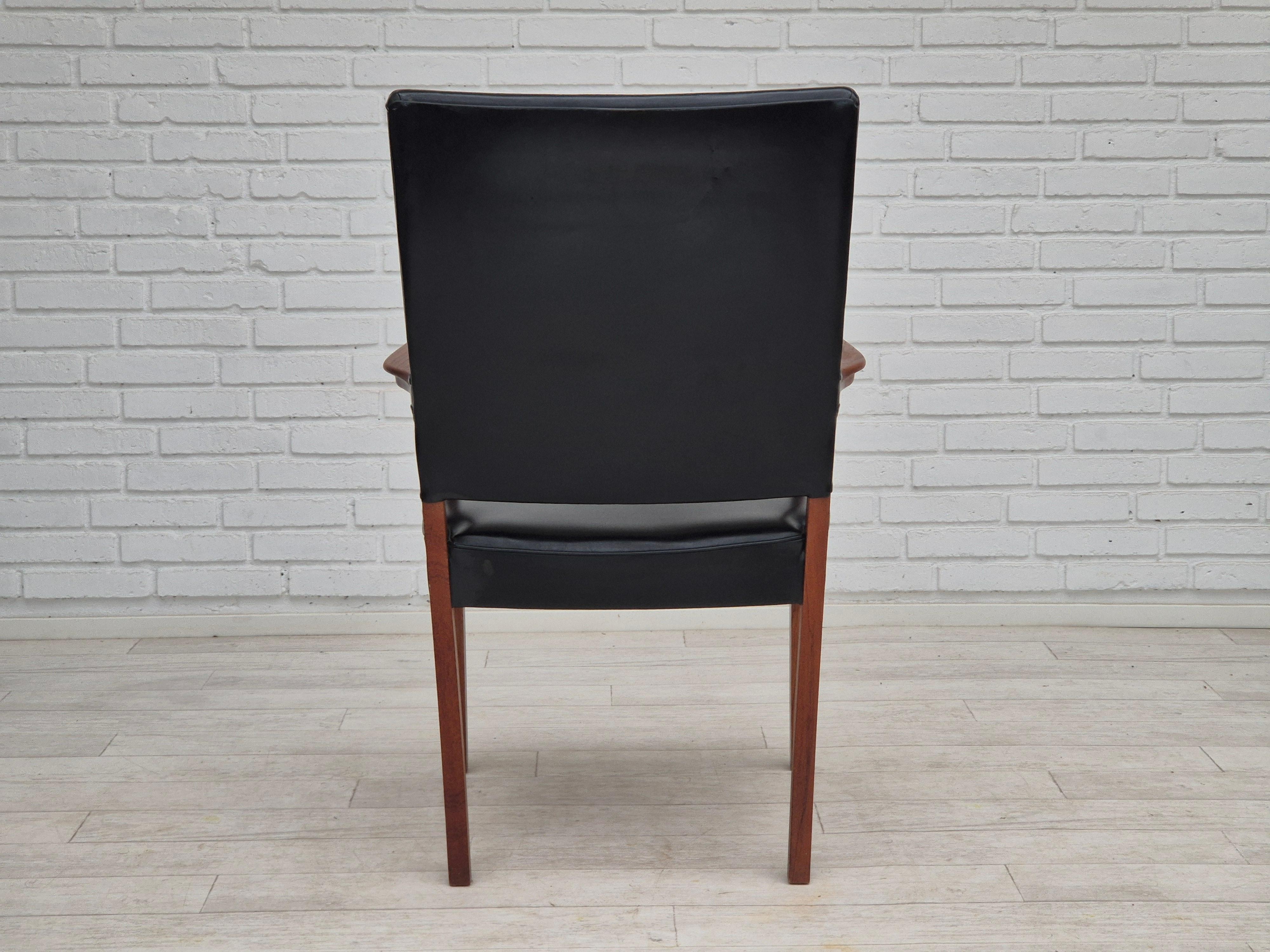 Mid-20th Century 1960s, Danish armchair, original condition, teak wood, artificial leather. For Sale