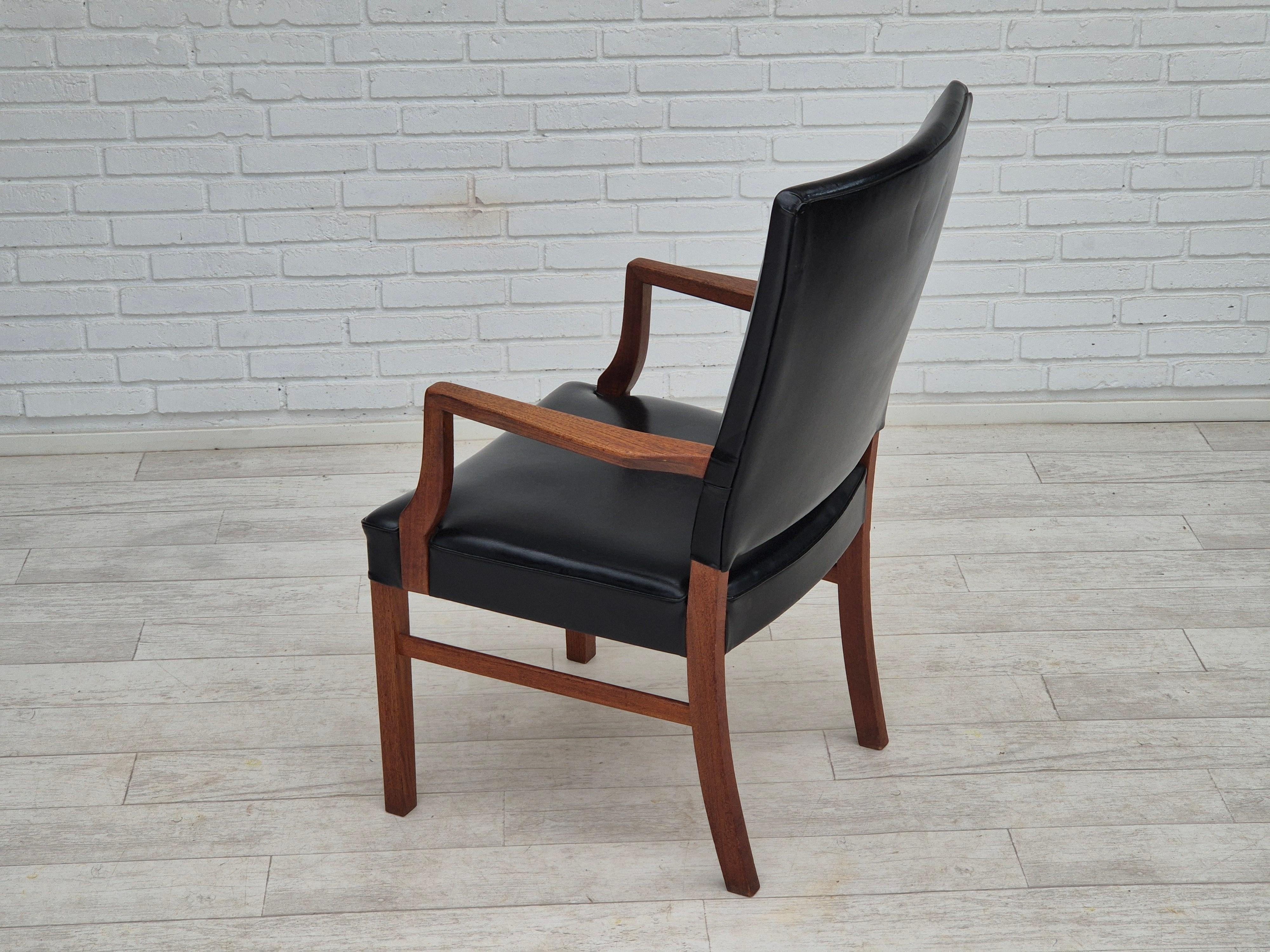 Faux Leather 1960s, Danish armchair, original condition, teak wood, artificial leather. For Sale