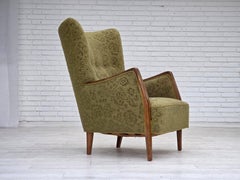 Poltrona danese degli anni '60, velluto verde originale, legno di frassino.