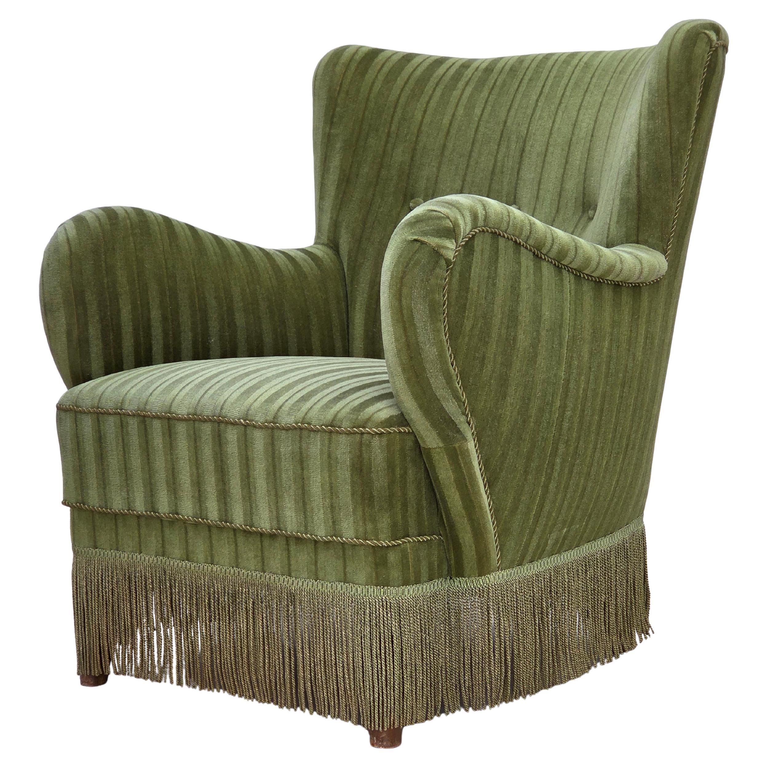 Fauteuil danois des années 1960, velours d'ameublement vert d'origine. en vente