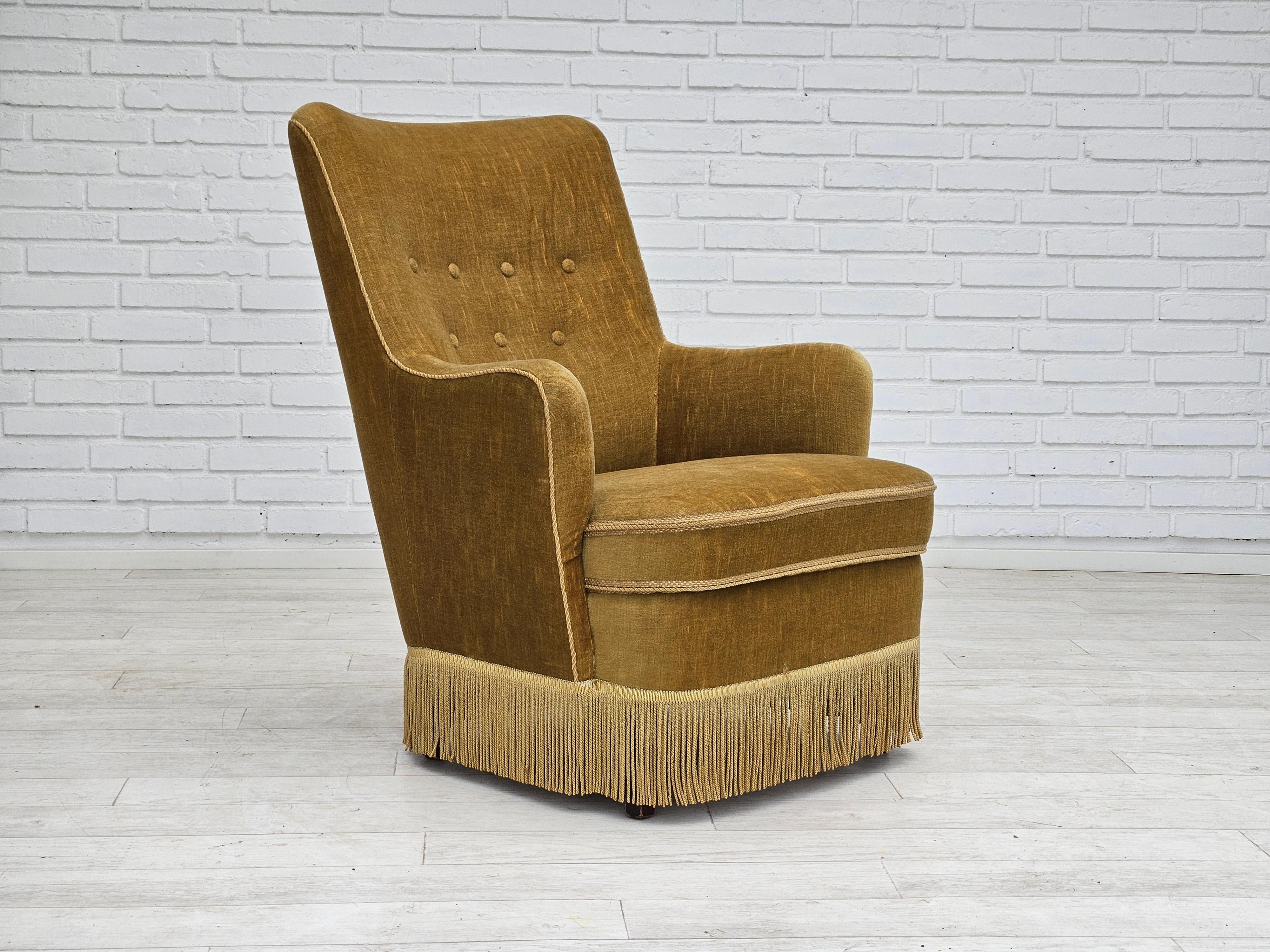 1960s, Danish armchair in light green velour. Original very good condition: no smells and no stains. Beech wood legs. Springs in the seat. Manufactured by a Danish furniture manufacturer in about 1960.
