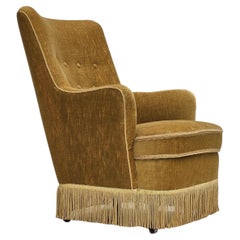 Fauteuil danois des années 1960, tapisserie d'origine, velours vert clair.