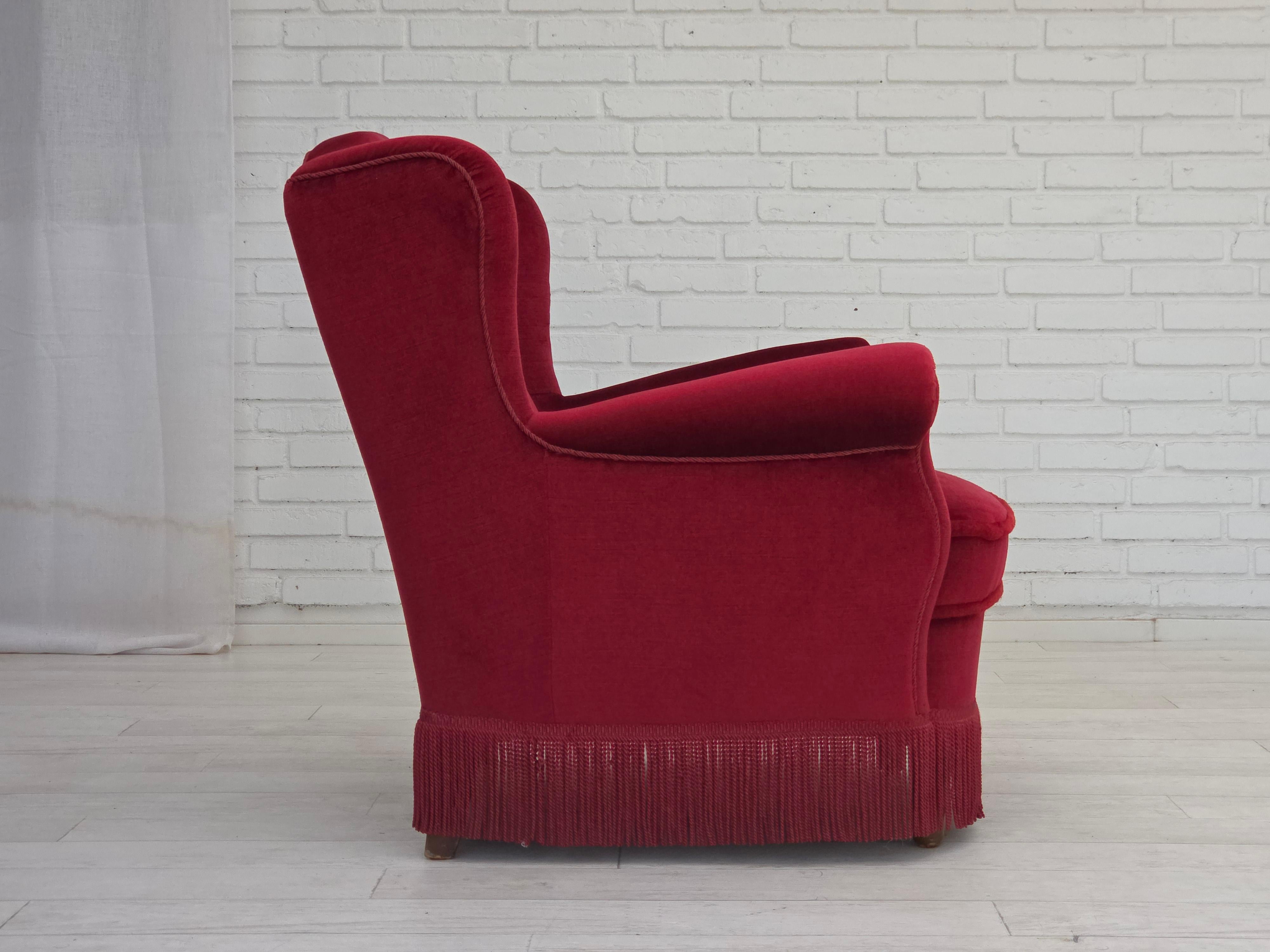 Scandinavian Modern 1960s, Danish armchair, red furniture velour, beech wood legs. For Sale