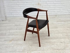 1960s, Danish armchair. Teak wood, black artificial leather.