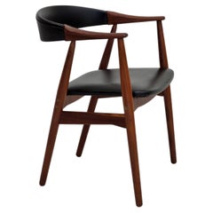 1960s, Danish armchair. Teak wood, black artificial leather.