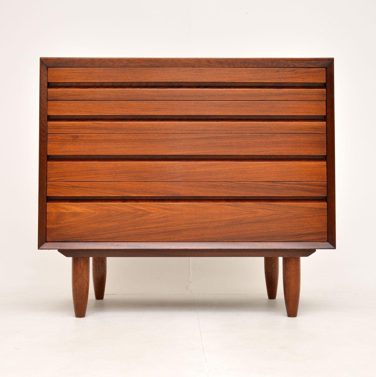A superb vintage Danish chest of drawers. This was designed by Poul Cadovius and was made in Denmark by Cado, it dates from the 1960’s.

The quality is outstanding, this is so well made and is a very useful size. The wood has a gorgeous colour and