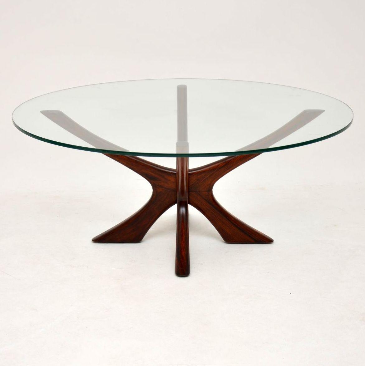 A stunning and extremely well made vintage coffee table, this was made in Denmark in the 1960’s. It was designed by Illum Wikkelso, it’s called the ‘Jax’ coffee table, and was manufactured by Neils Eilersen. We have had the base stripped and