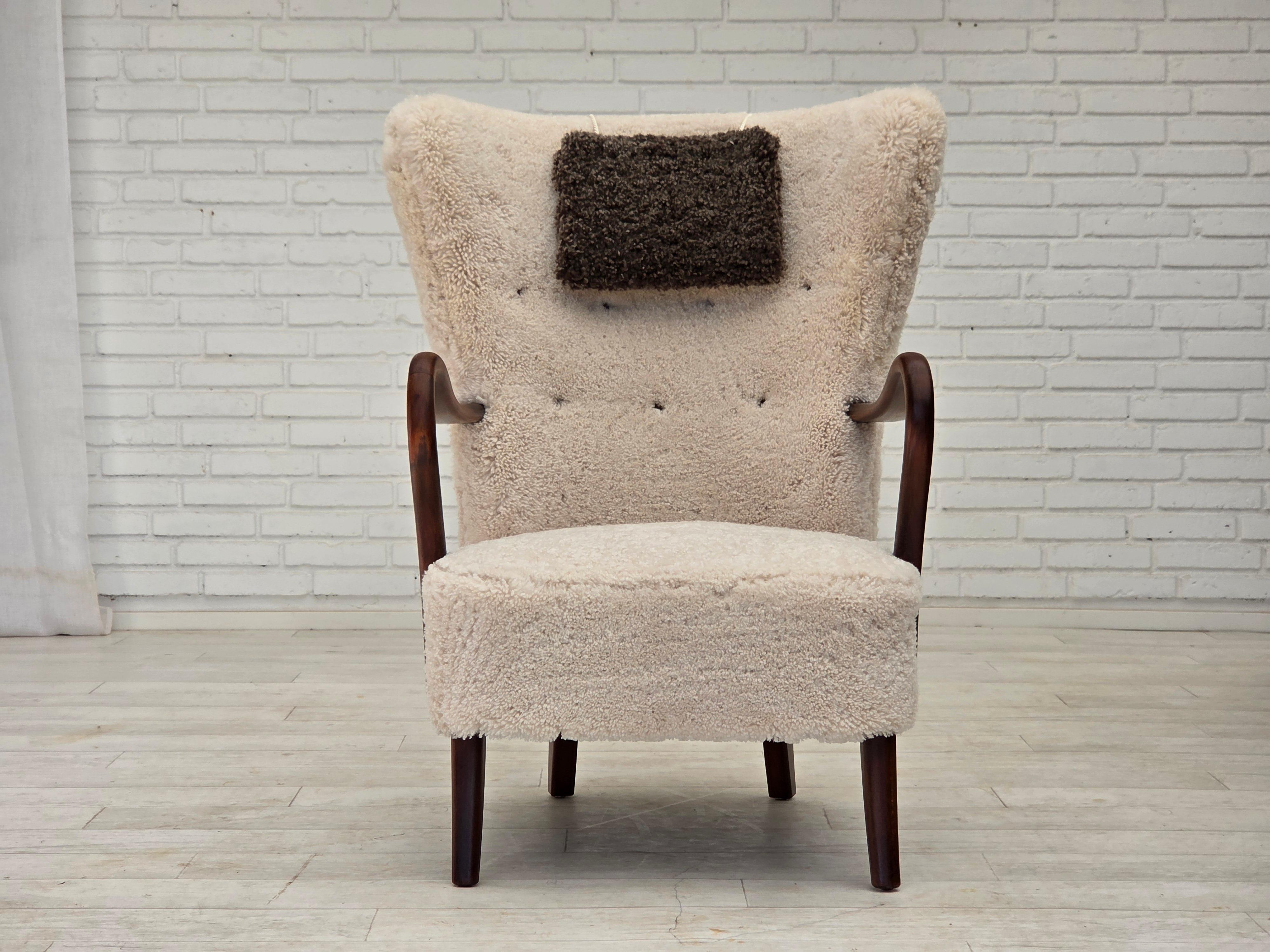 Mid-20th Century 1960s, Danish design by A. Christensen for Slagelse Møbelværk, sheepskin. For Sale