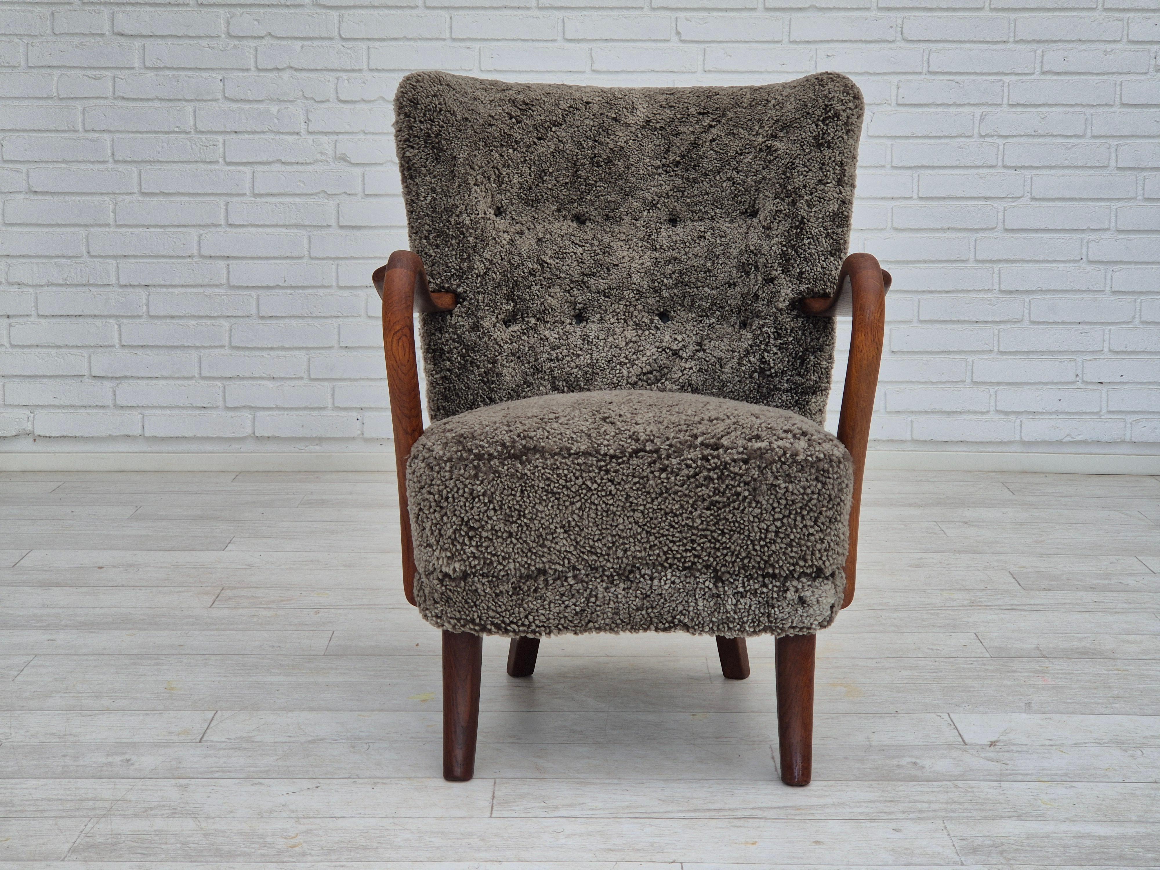 Scandinavian Modern 1960s, Danish design by Alfred Christensen, refupholstered armchair, sheepskin.