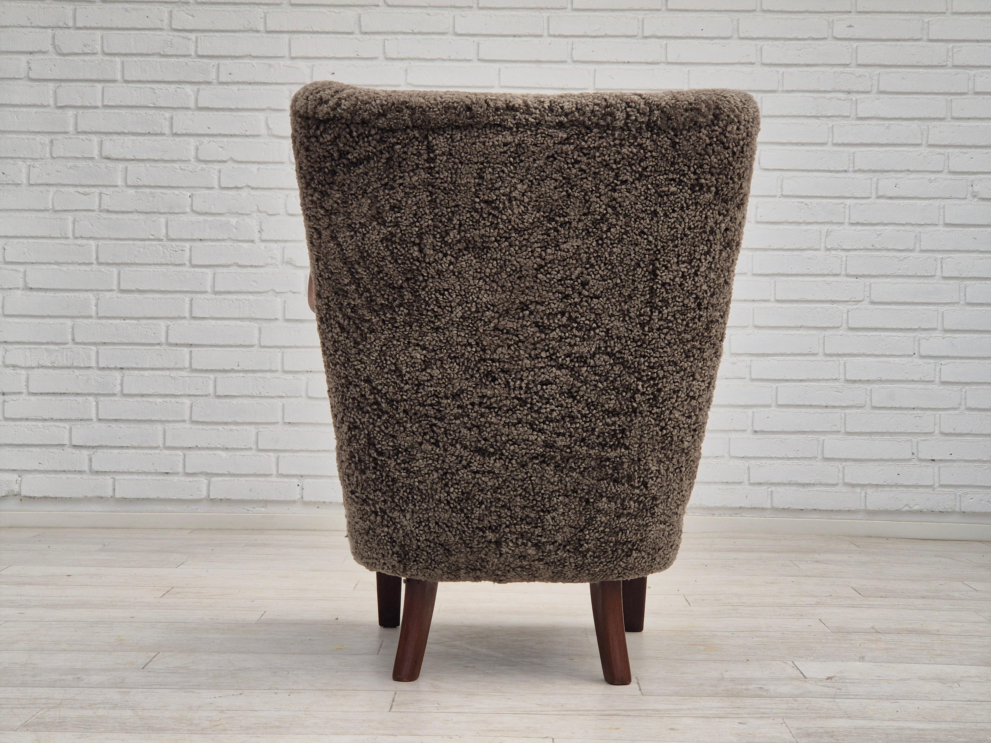 1960s, Danish design by Alfred Christensen, refupholstered armchair, sheepskin. 1