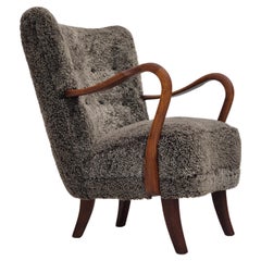 1960s, Danish design by Alfred Christensen, refupholstered armchair, sheepskin.