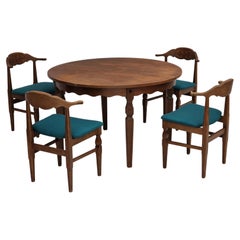 Années 1960, design danois par Henning Kjærnulf, ensemble de table et quatre chaises.