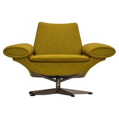 Vintage 1960s, Danish design by Johannes Andersen, completely reupholstered armchair.