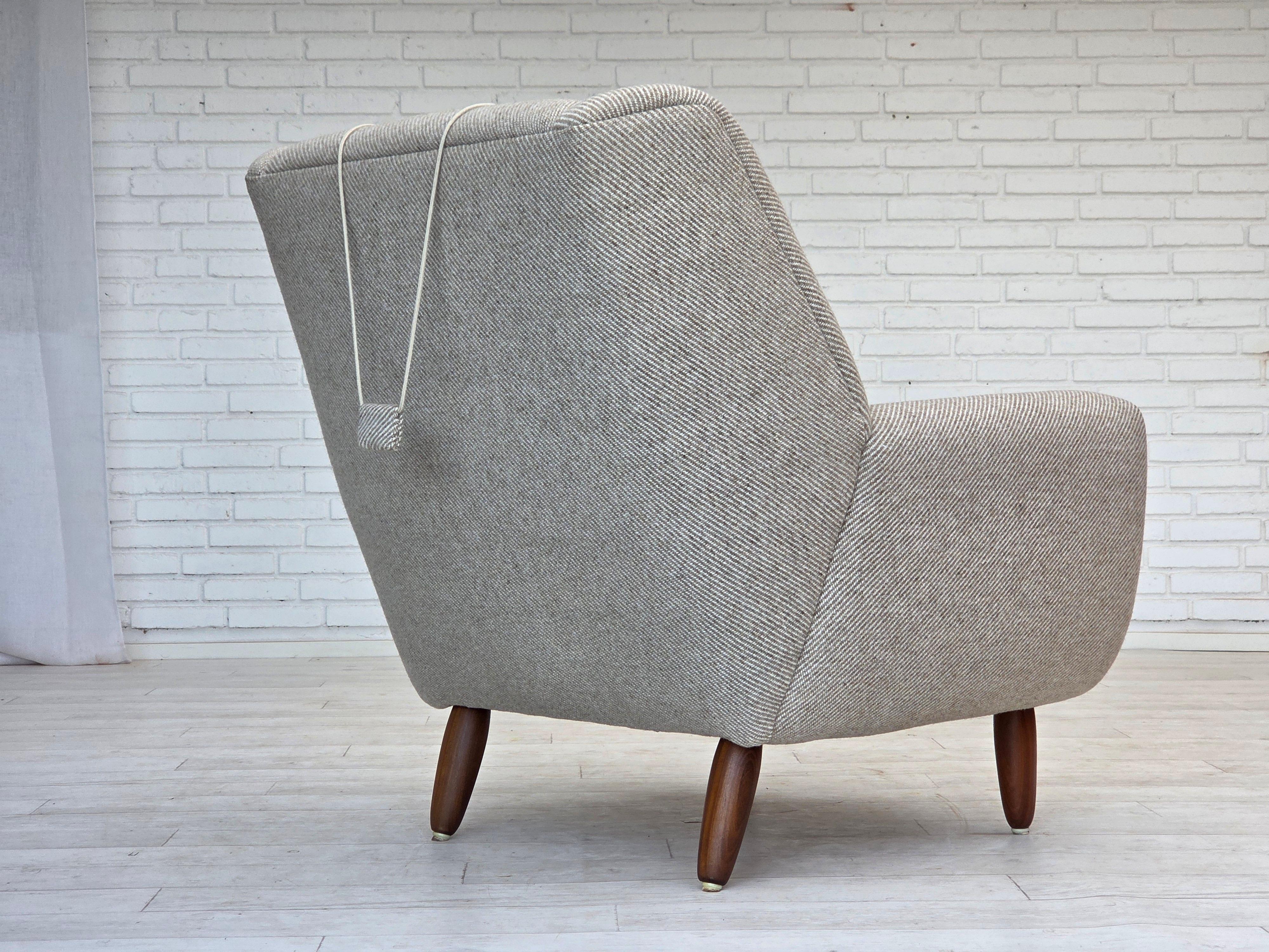 Anni '60, design danese di Kurt Østervig per Rolschau Møbler, poltrona modello 61. In condizioni buone in vendita a Tarm, 82