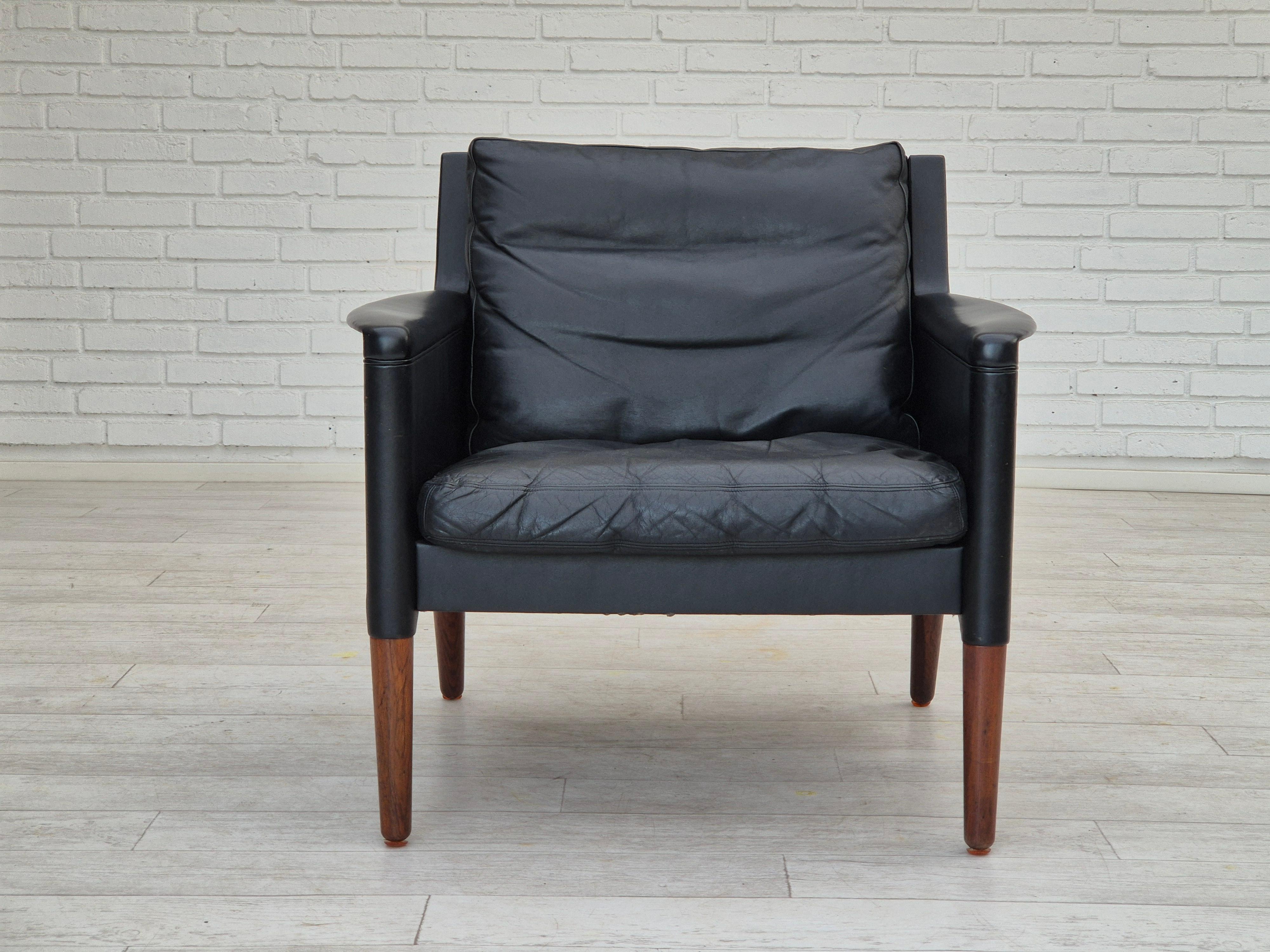 Scandinavian Modern 1960s, Danish design by Kurt Østervig, lounge chair model 55, leather, rosewood. For Sale