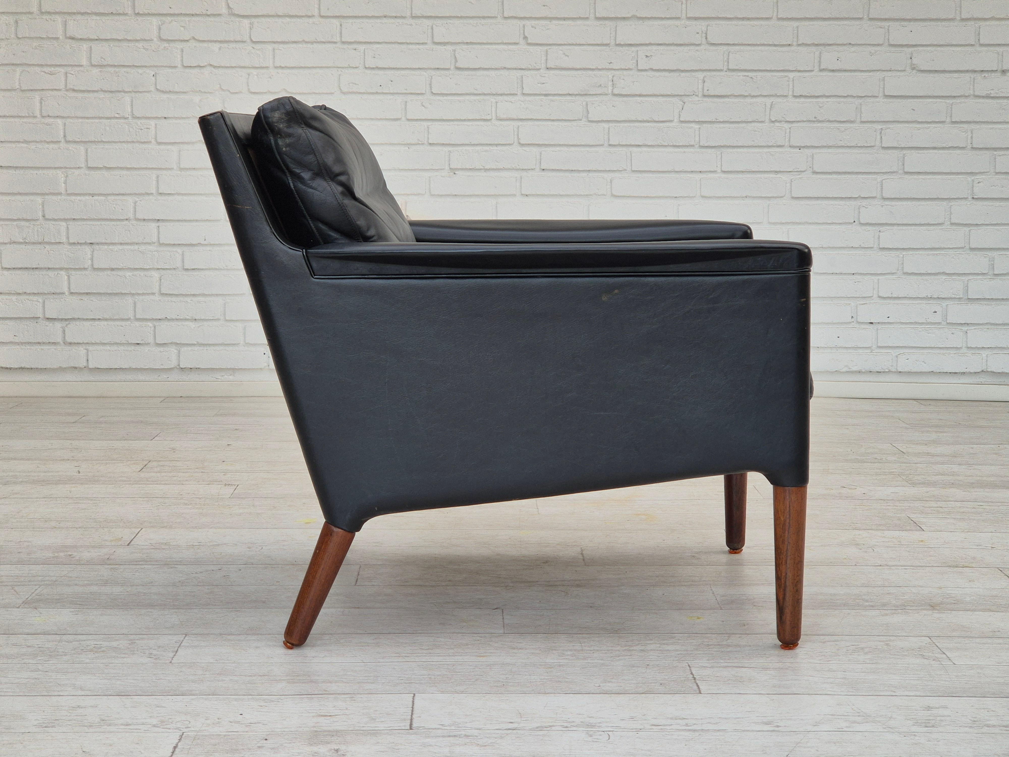Mid-20th Century 1960s, Danish design by Kurt Østervig, lounge chair model 55, leather, rosewood. For Sale