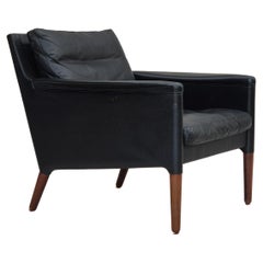 Années 1960, Design/One danois de Kurt Østervig, chaise longue modèle 55, cuir, bois de rose.