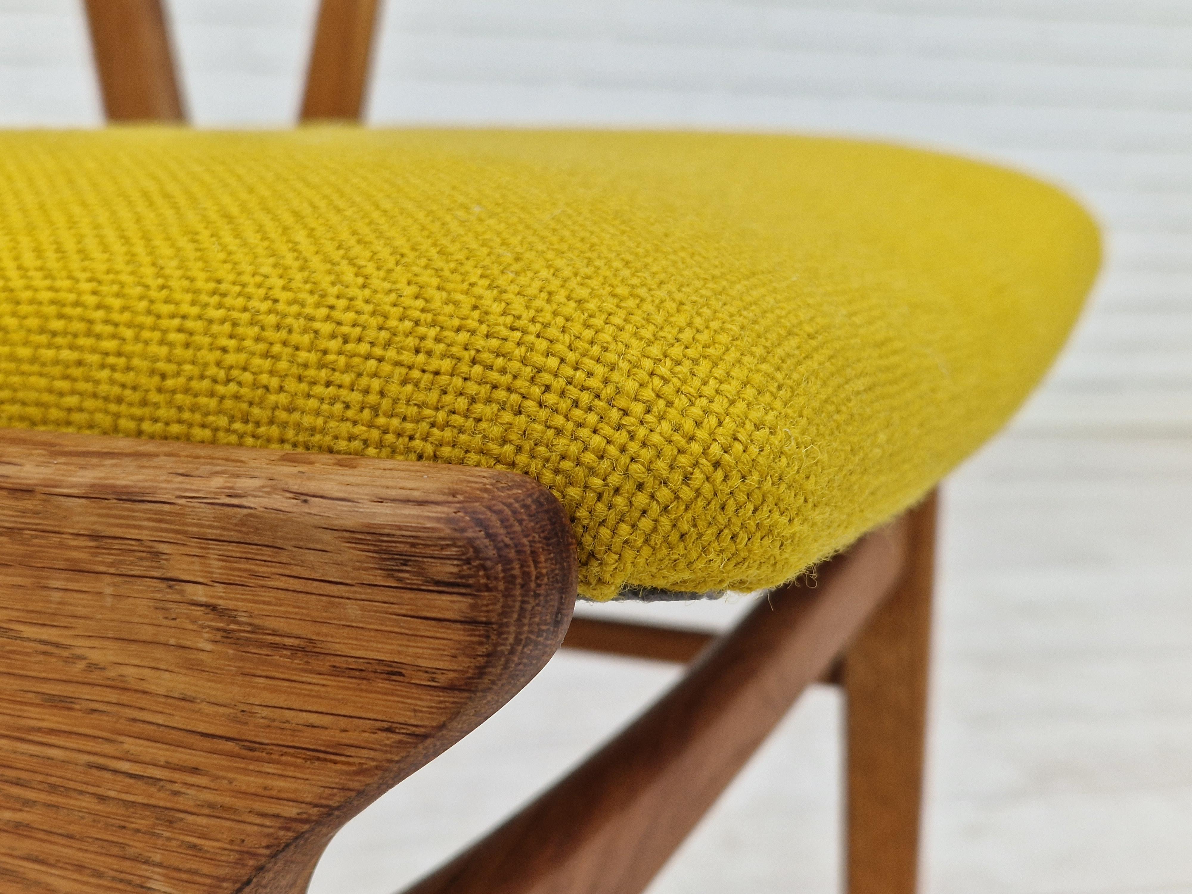 1960s, Danish design. Reupholstered and renewed armchair in quality KVADRAT furniture wool Halingdal. Renewed oak wood. Armrest in teakwood. Renewed and reupholstered by professional upholsterer, craftsman.