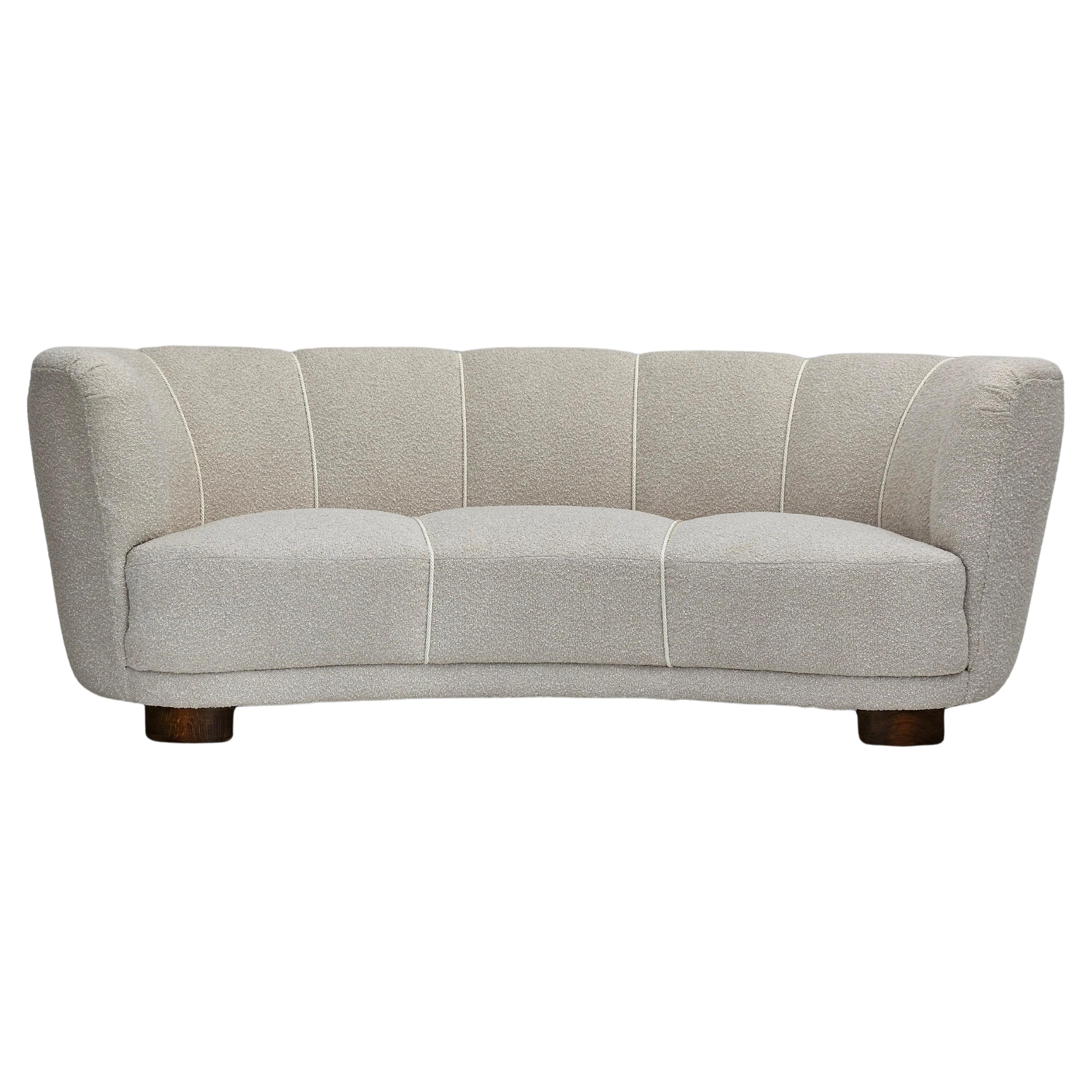 1960s, Danish design, reupholstered 3-seater "Banana" sofa, beige/creamy fabric. For Sale