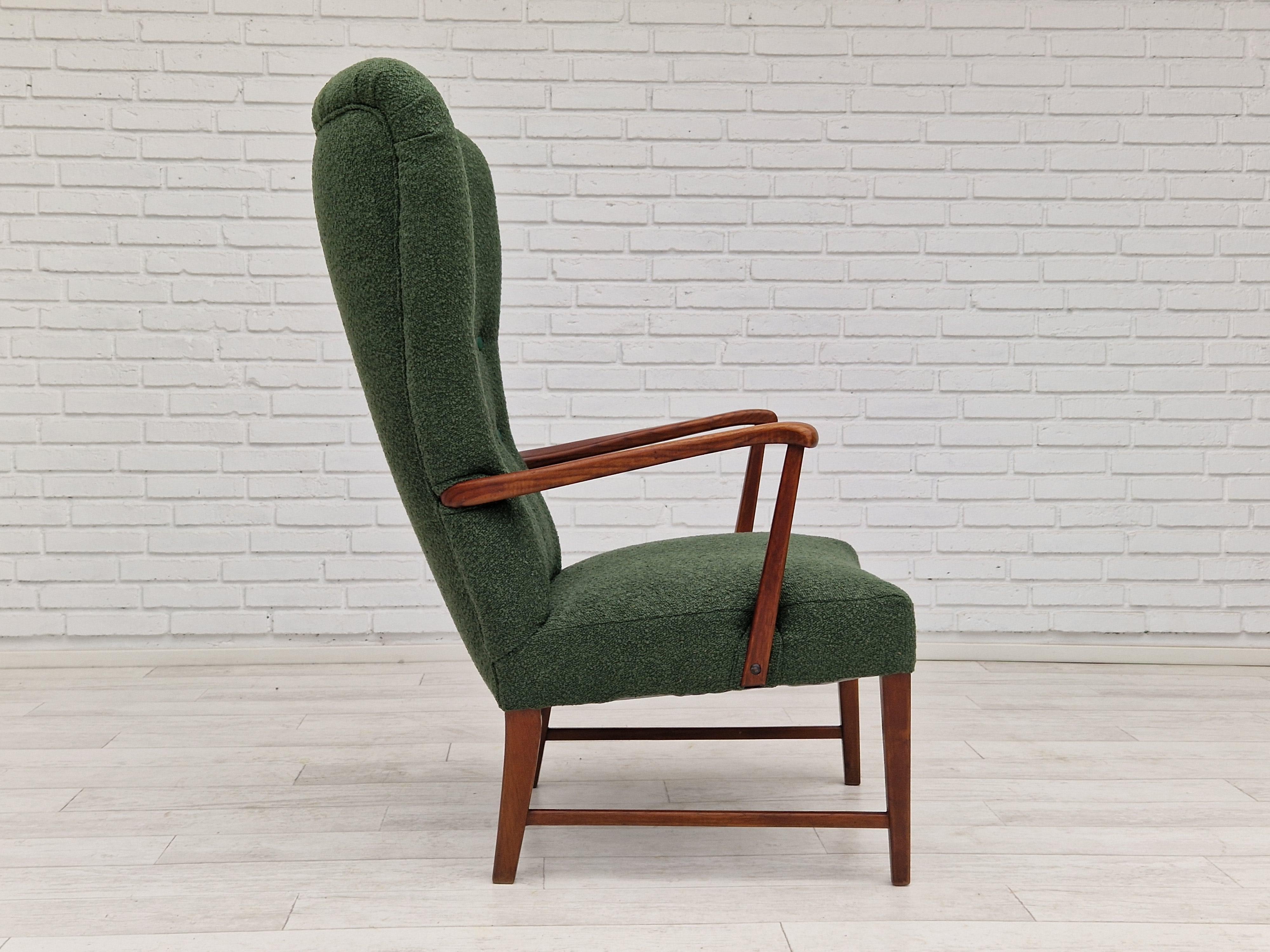 Mid-20th Century 1960s, Danish design, reupholstered high-back armchair, bottle green fabric. For Sale