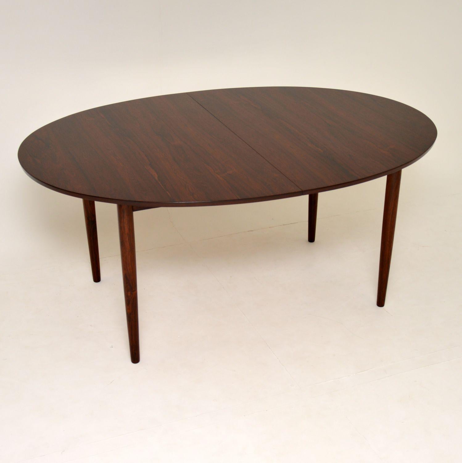 An extremely rare and beautiful Danish dining table, designed by Finn Juhl. This was made in Denmark in the 1960s by the master cabinet maker Niels Vodder. It was kept covered for 50 years by the previous owner, so it’s still in excellent condition
