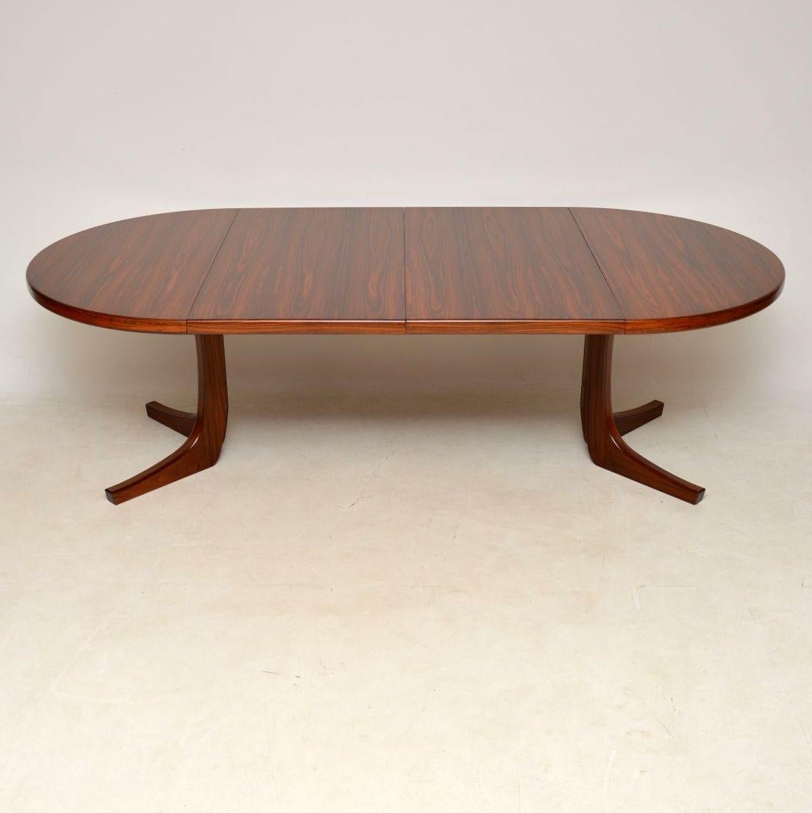 A beautiful and extremely well made vintage extending dining table, this was made in Denmark and dates from the 1960s-1970s. It’s of amazing quality, this has two extra leaves that come with to extend the dining area significantly. The condition is