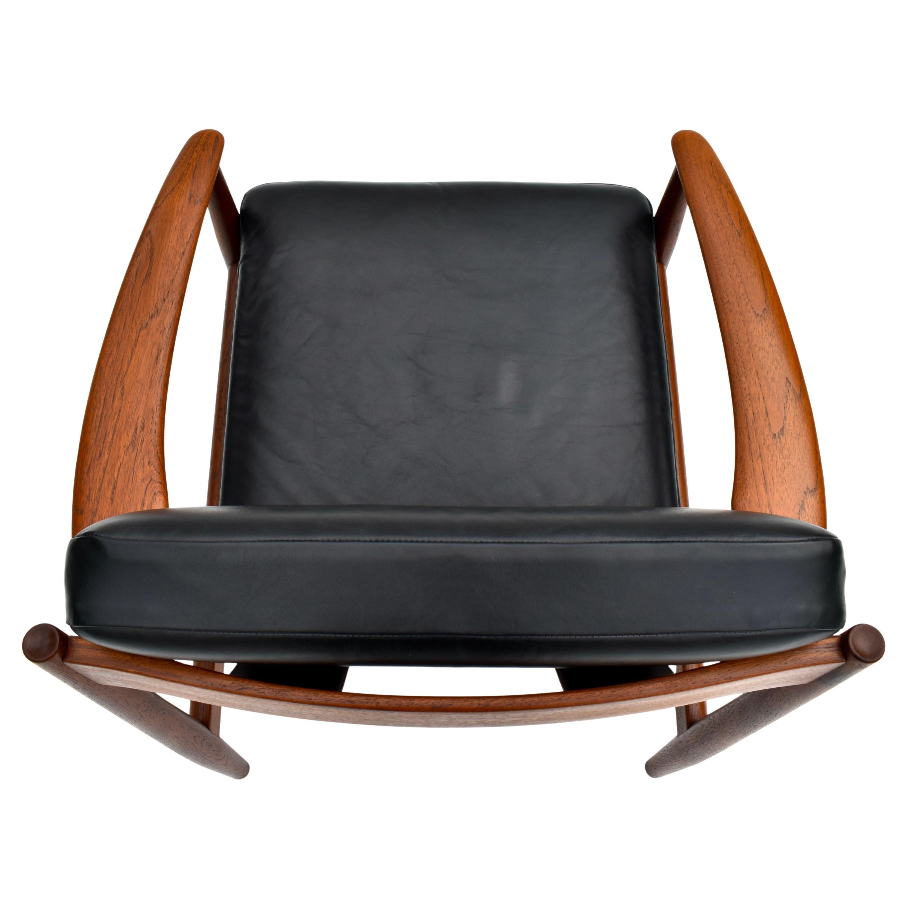 Sedia da salotto danese Grete Jalk in teak e pelle del 1960