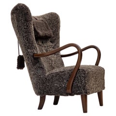 Años 60, sillón danés de respaldo alto de Alfred Christensen, piel de oveja auténtica.