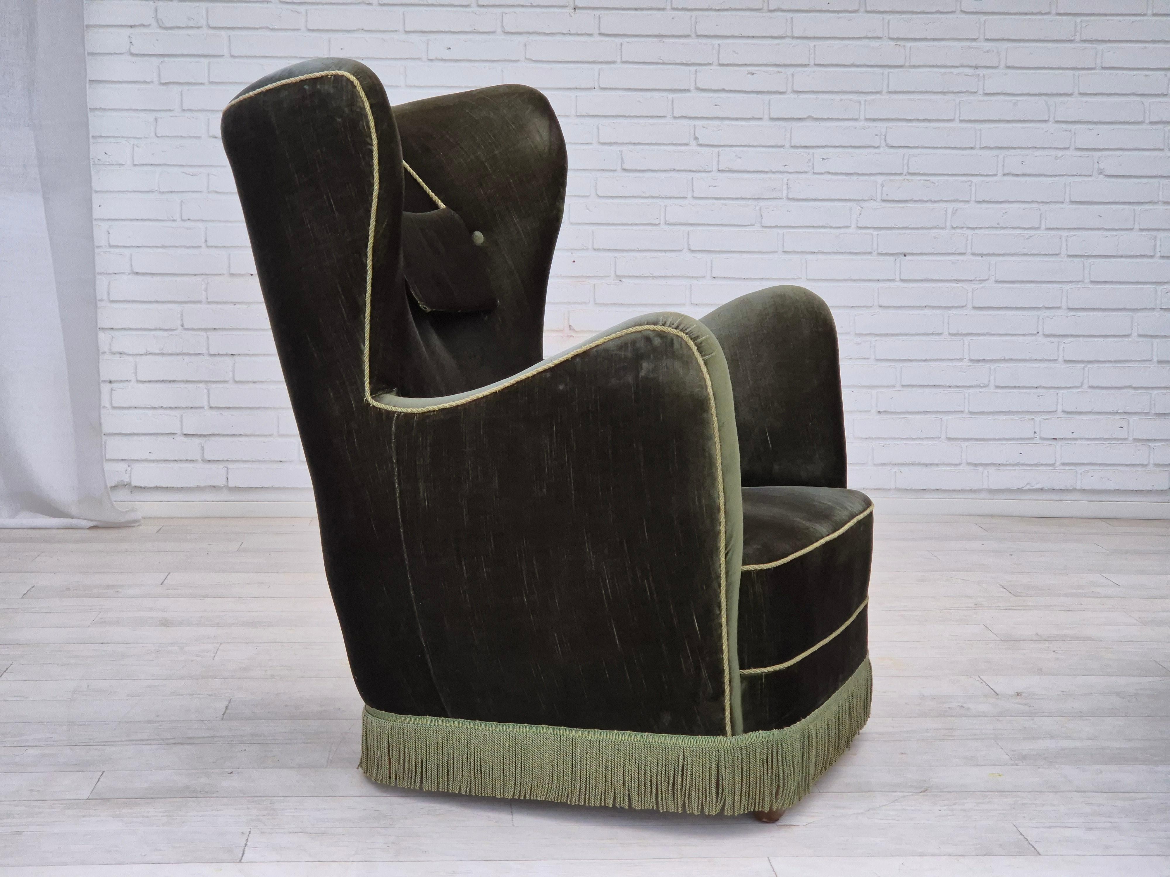 1960s, Danish relax chair. Original good condition: no smells and no stains. Original dark green furniture velour. Brass springs in the seat, beech wood legs. Manufactured by Danish furniture maker in about 1965-1970s. The chair was checked by