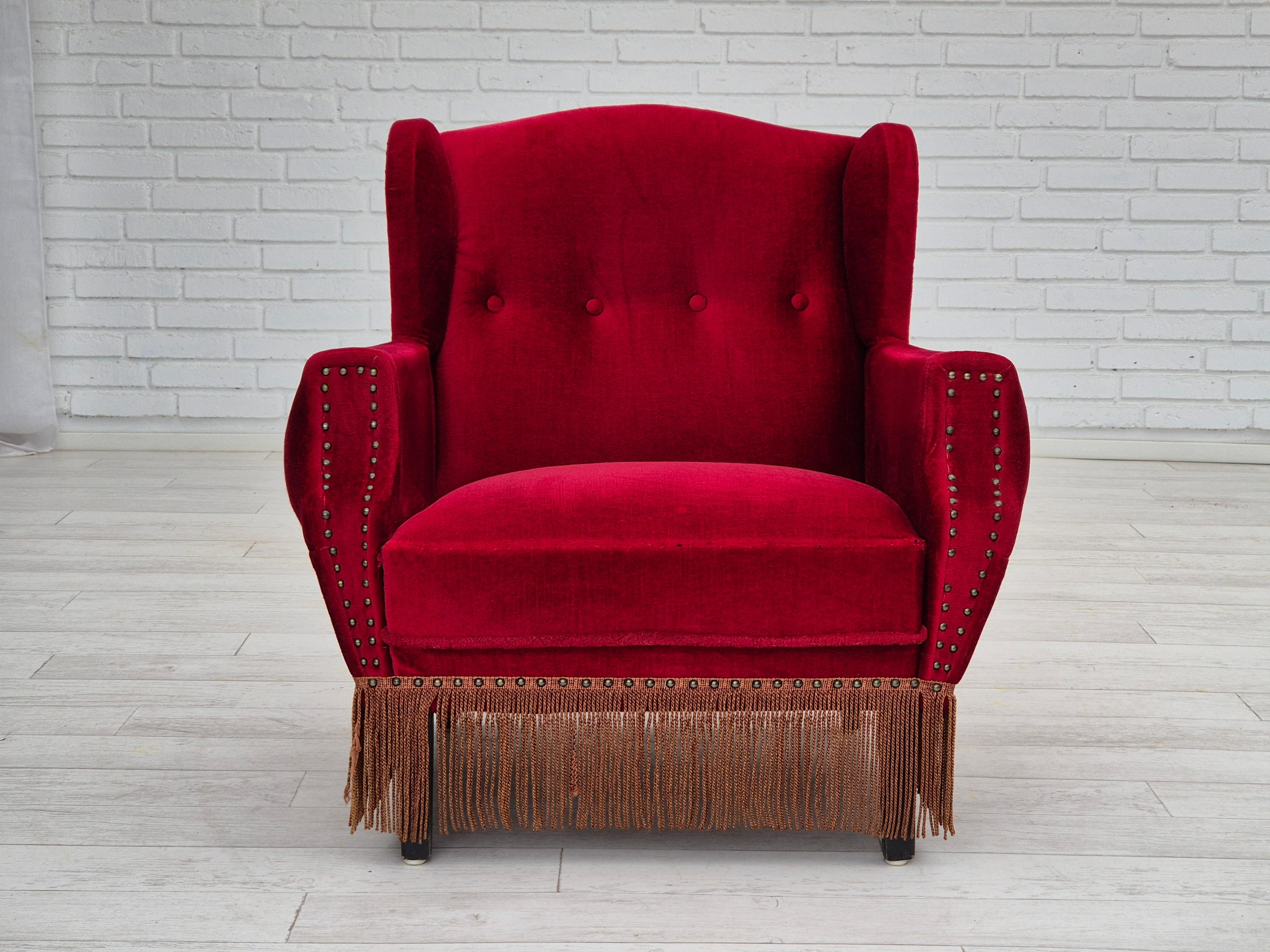 Scandinavian Modern 1960s, Danish lounge chair, original, furniture velour, oak wood legs. For Sale